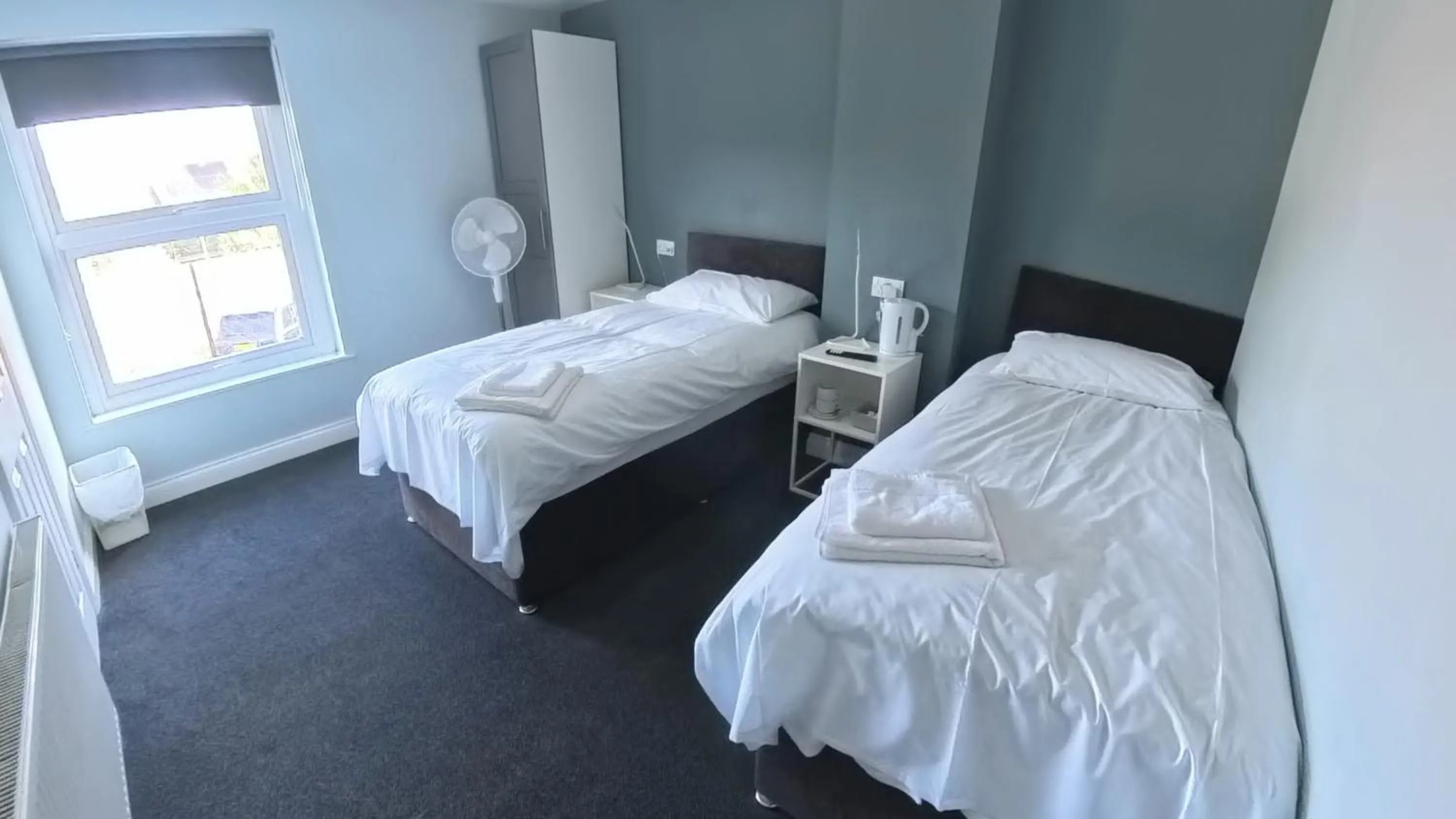 Photo of the whole room, Bed in The Riverside