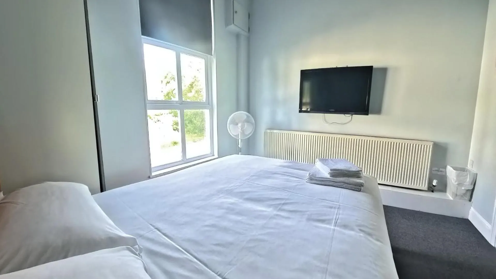 Photo of the whole room, Bed in The Riverside