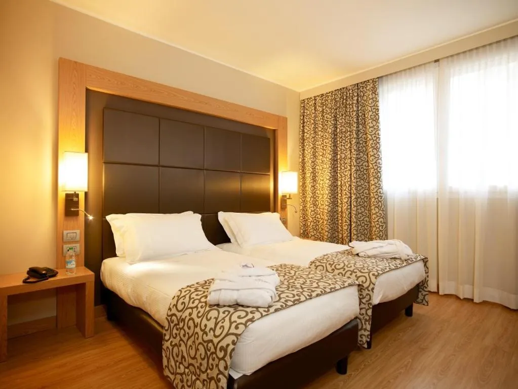 Bed in Virginia Palace Hotel