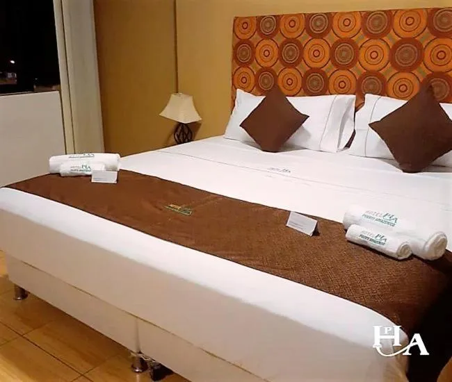 Bed in Hotel Puerto Amazonico