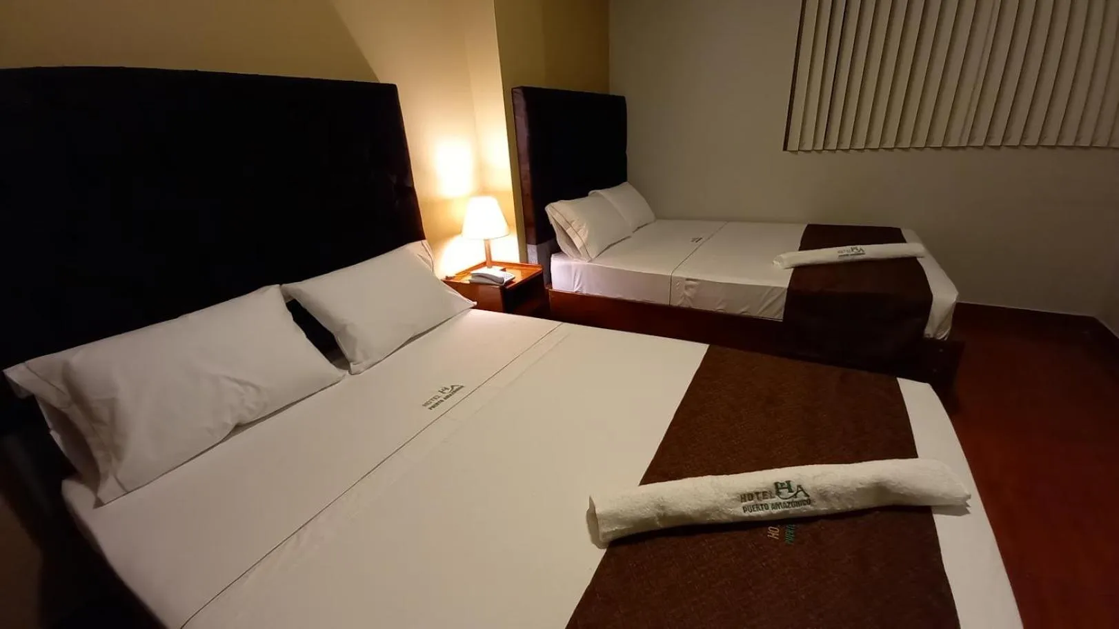 Bed in Hotel Puerto Amazonico