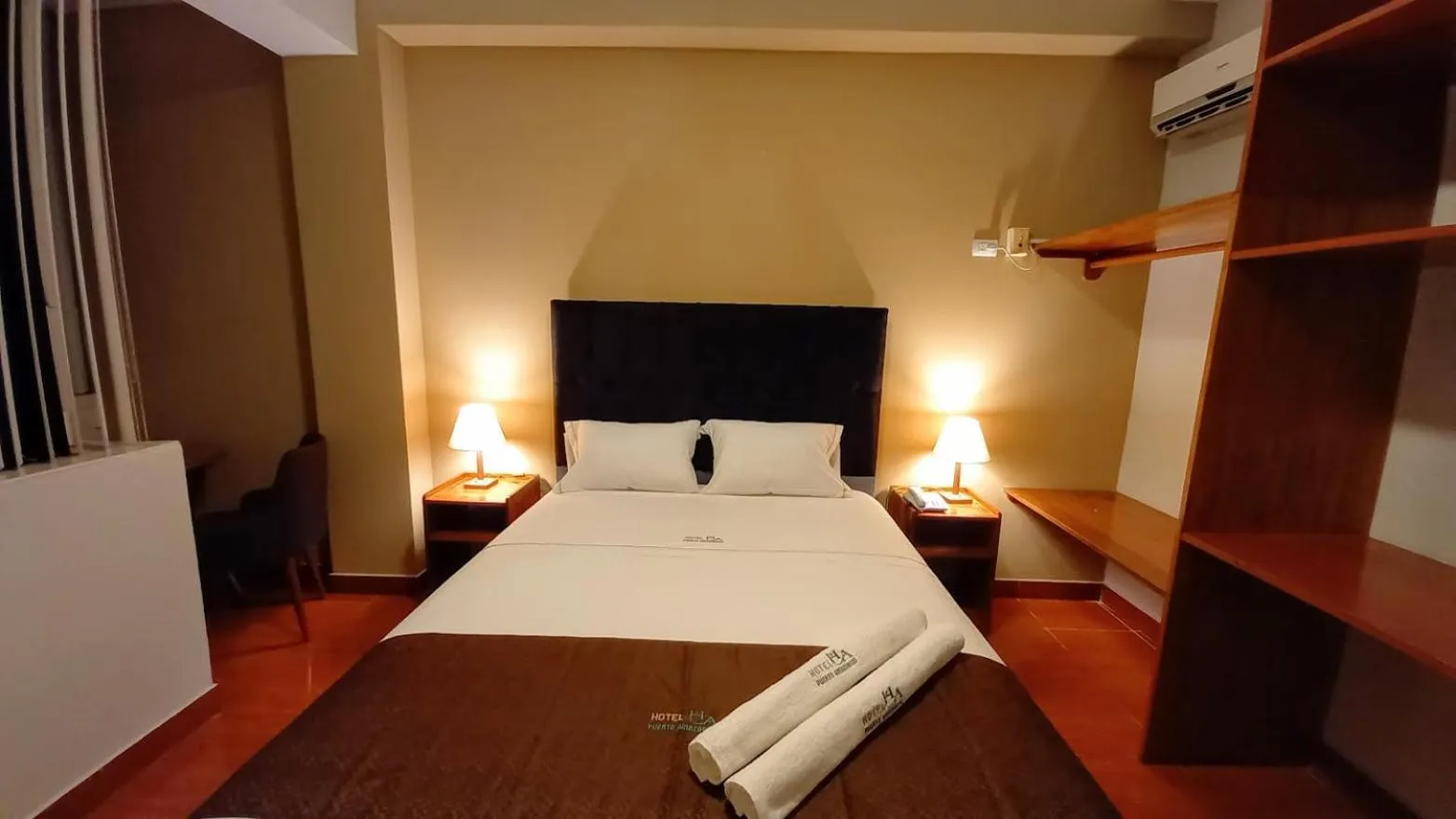 Bed in Hotel Puerto Amazonico