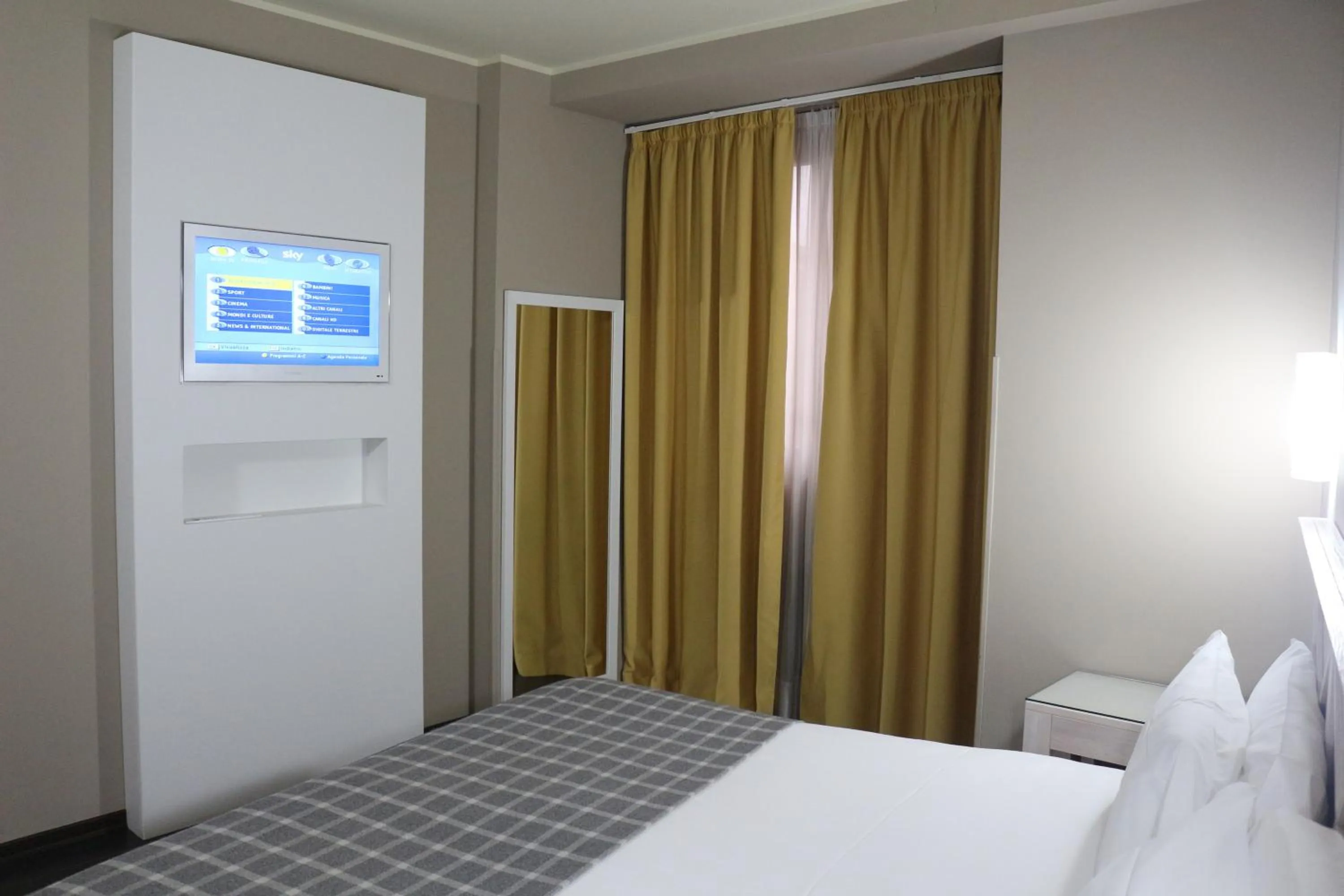 Bed in Hotel Garibaldi