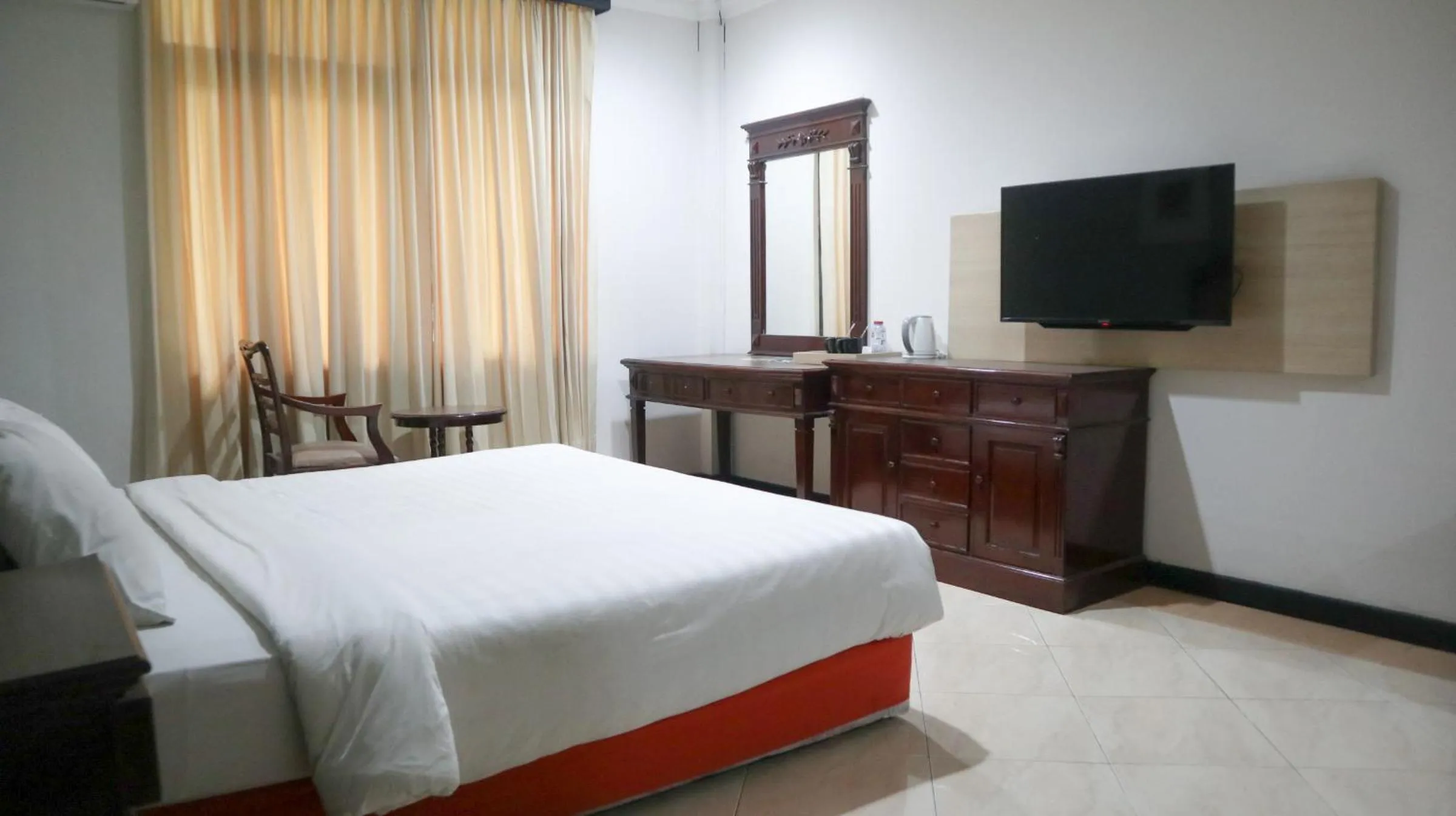 Photo of the whole room, Bed in Hotel Sofia Juanda Surabaya