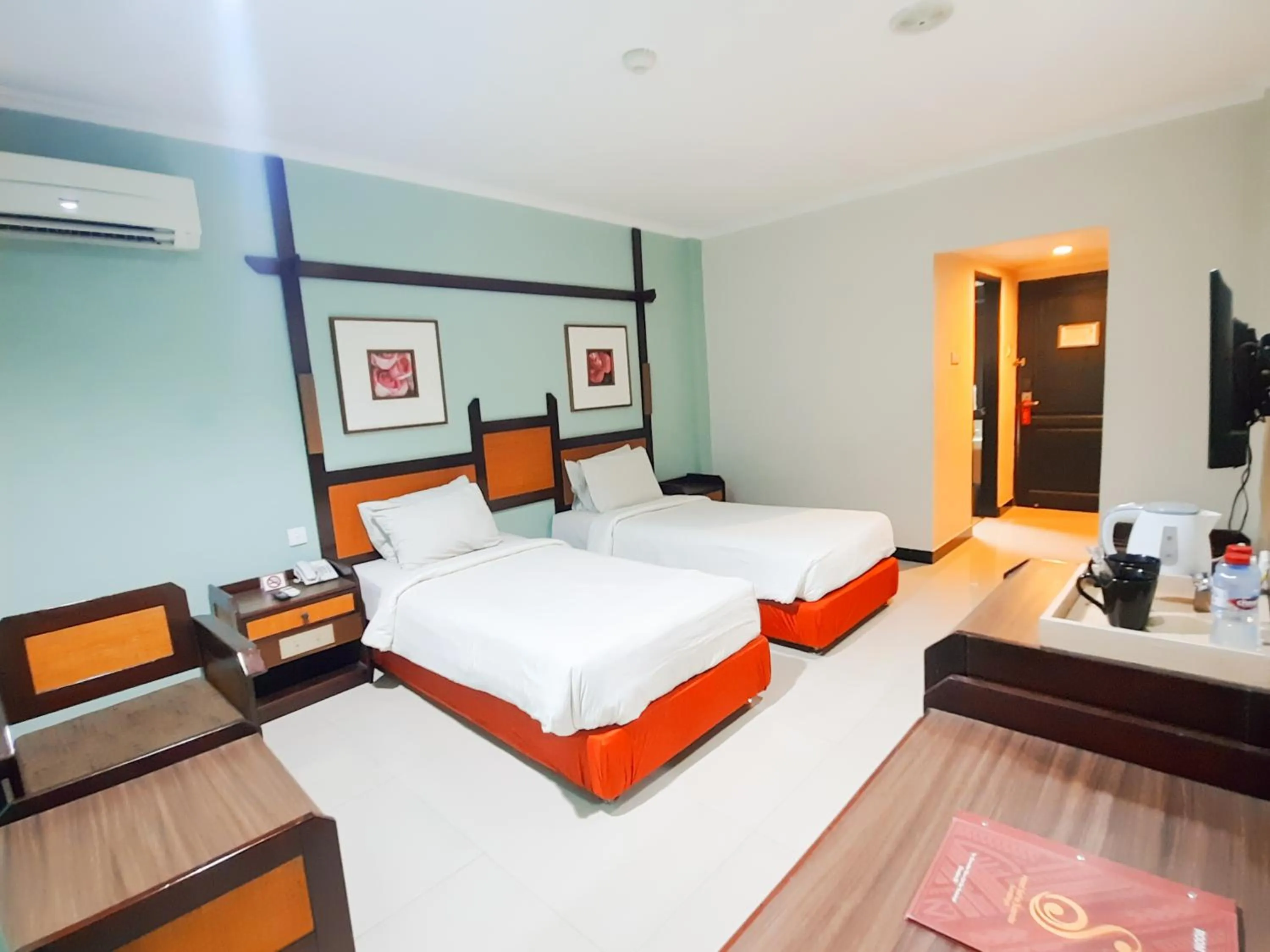 Photo of the whole room, Bed in Hotel Sofia Juanda Surabaya