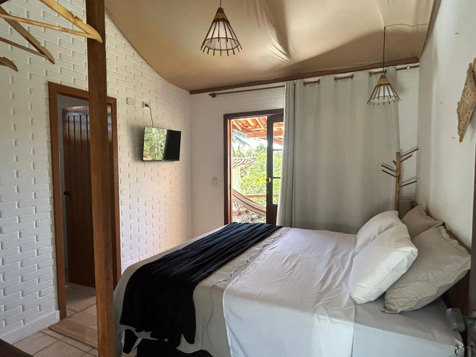 Bedroom, Bed in Pousada Jardim das Bromélias