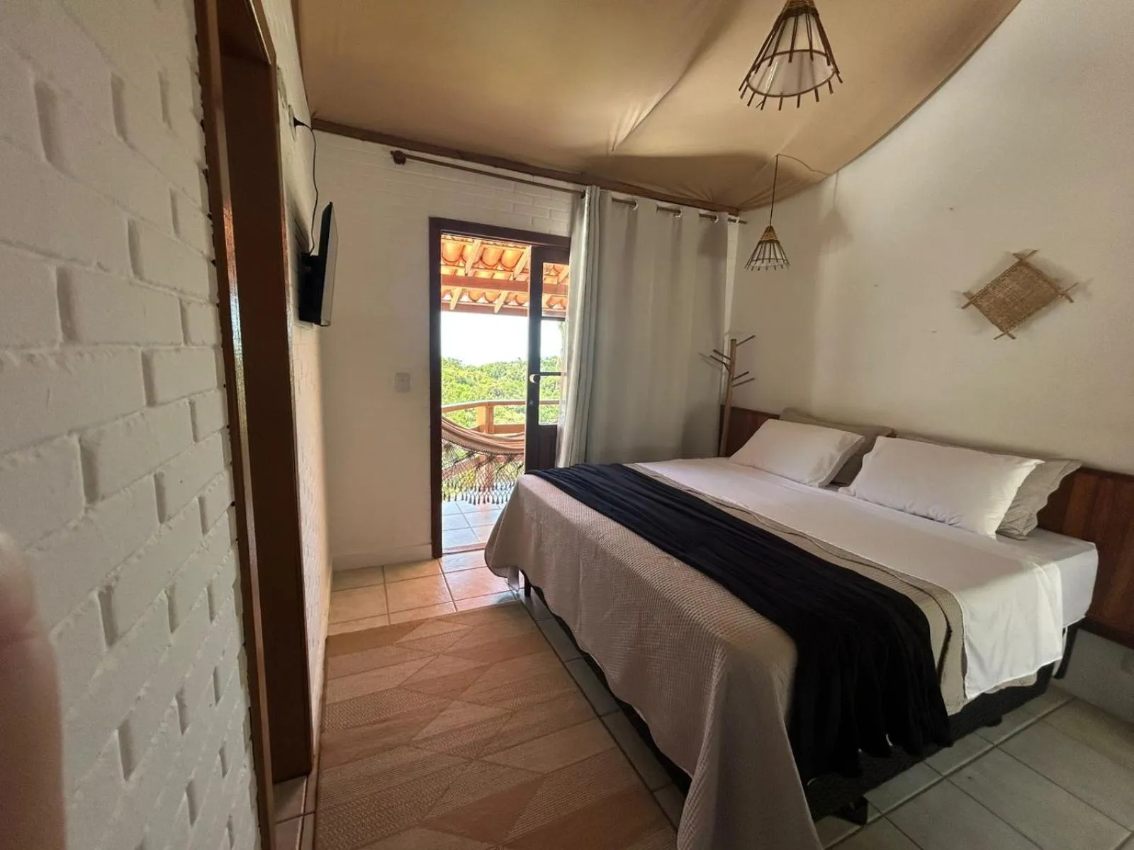 Bedroom, Bed in Pousada Jardim das Bromélias