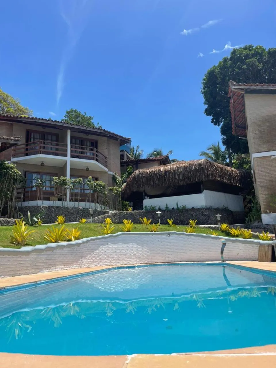 Swimming pool in Pousada Jardim das Bromélias