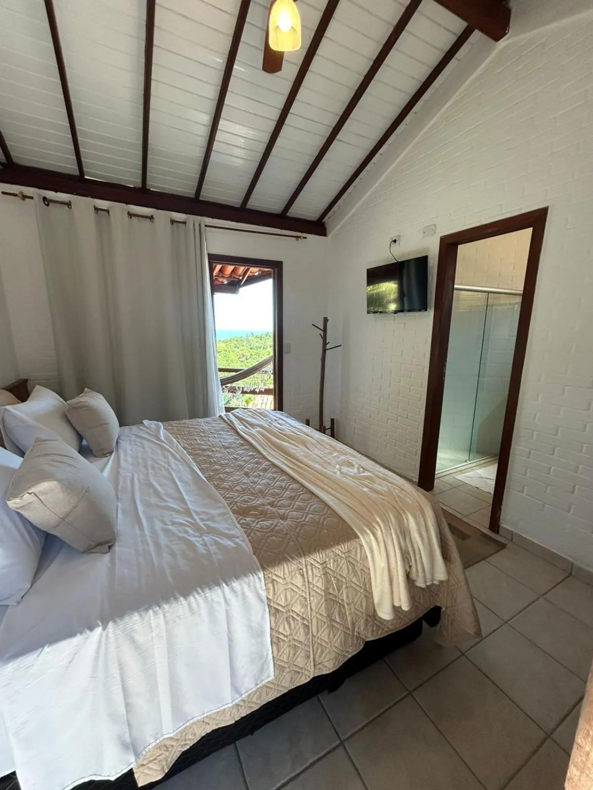 Bed in Pousada Jardim das Bromélias