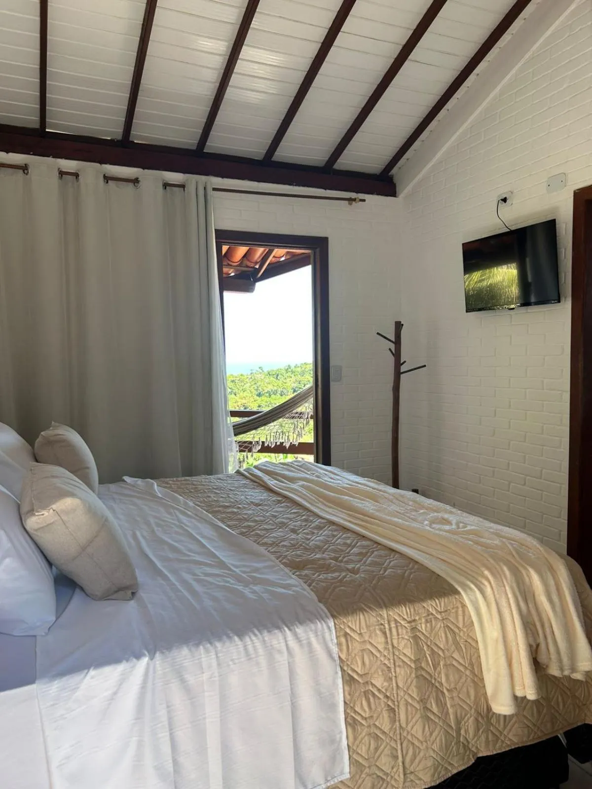 Bed in Pousada Jardim das Bromélias