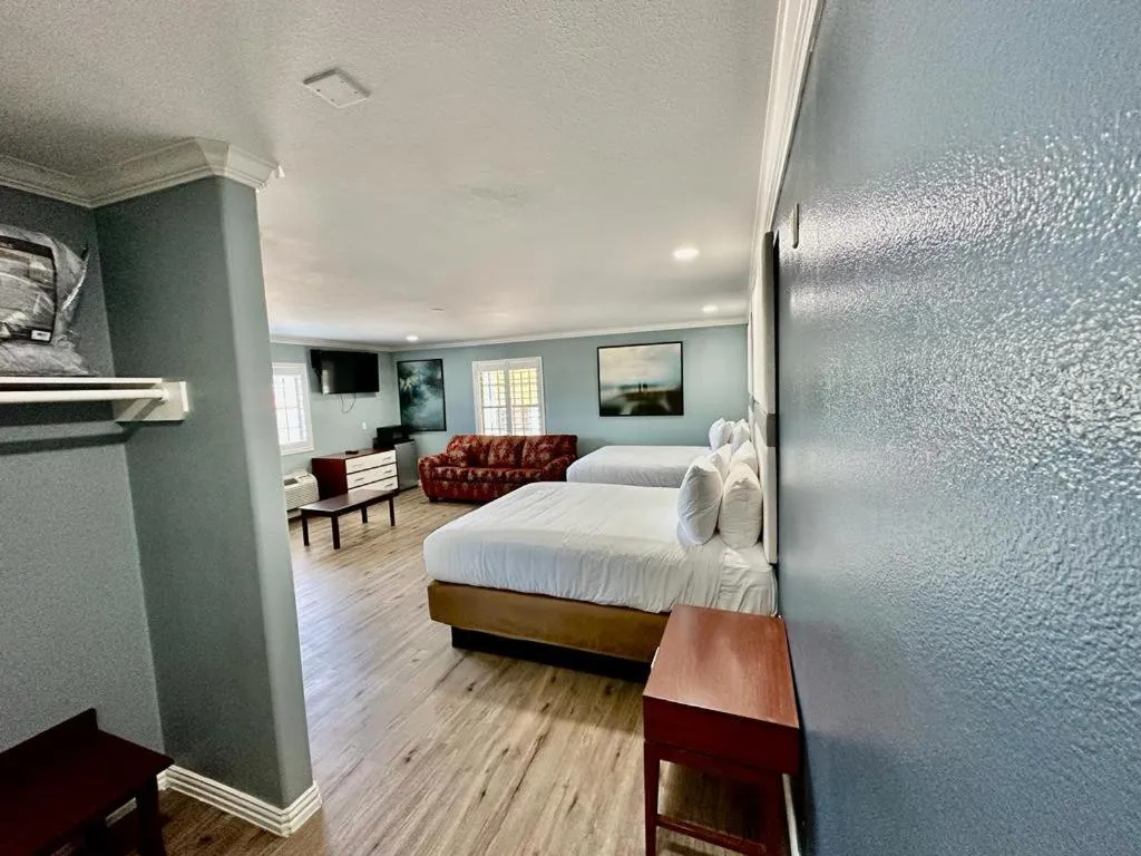 Bed in Executive Inn & Suites Magnolia