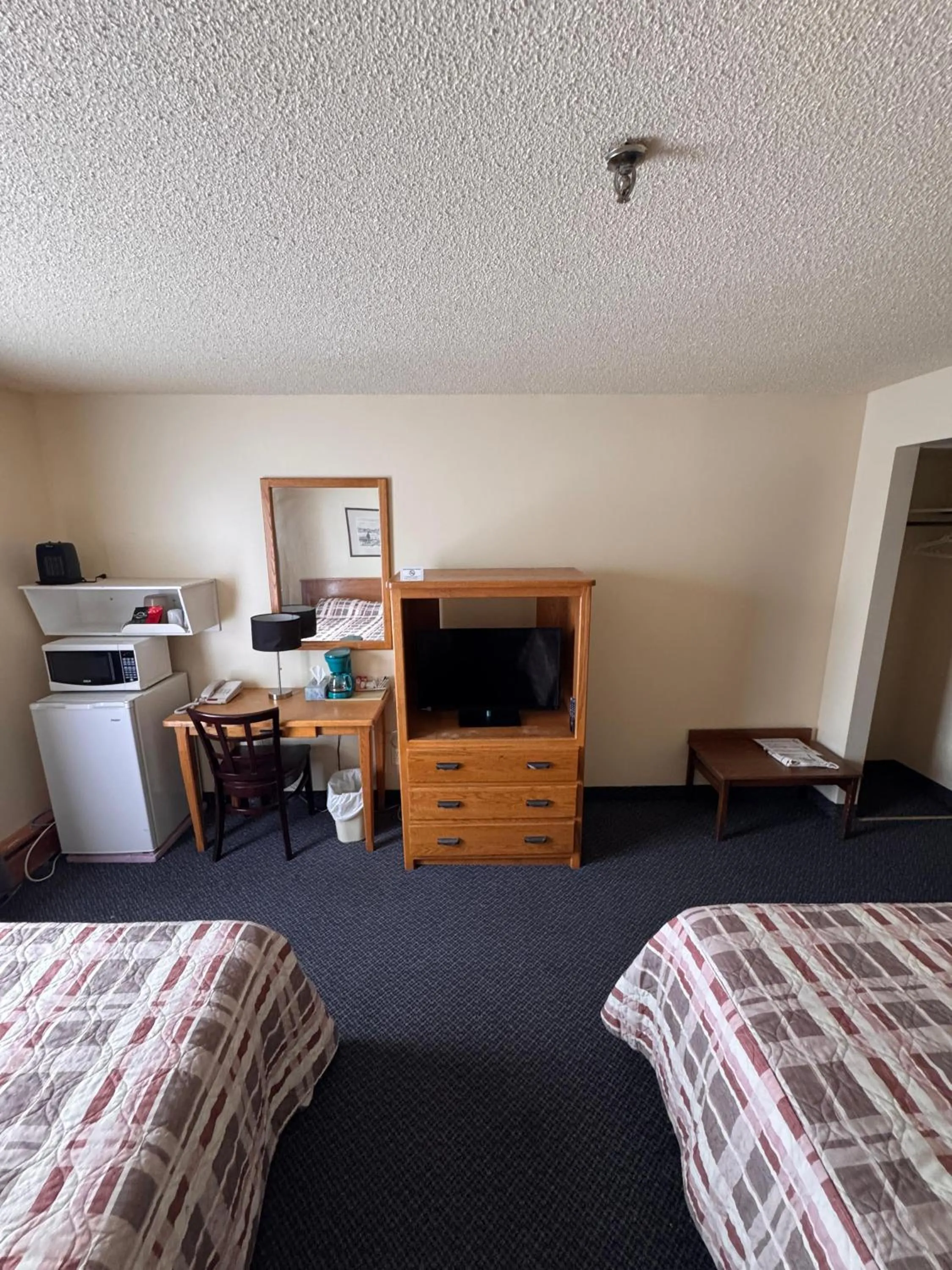 Bed in Discovery Inn