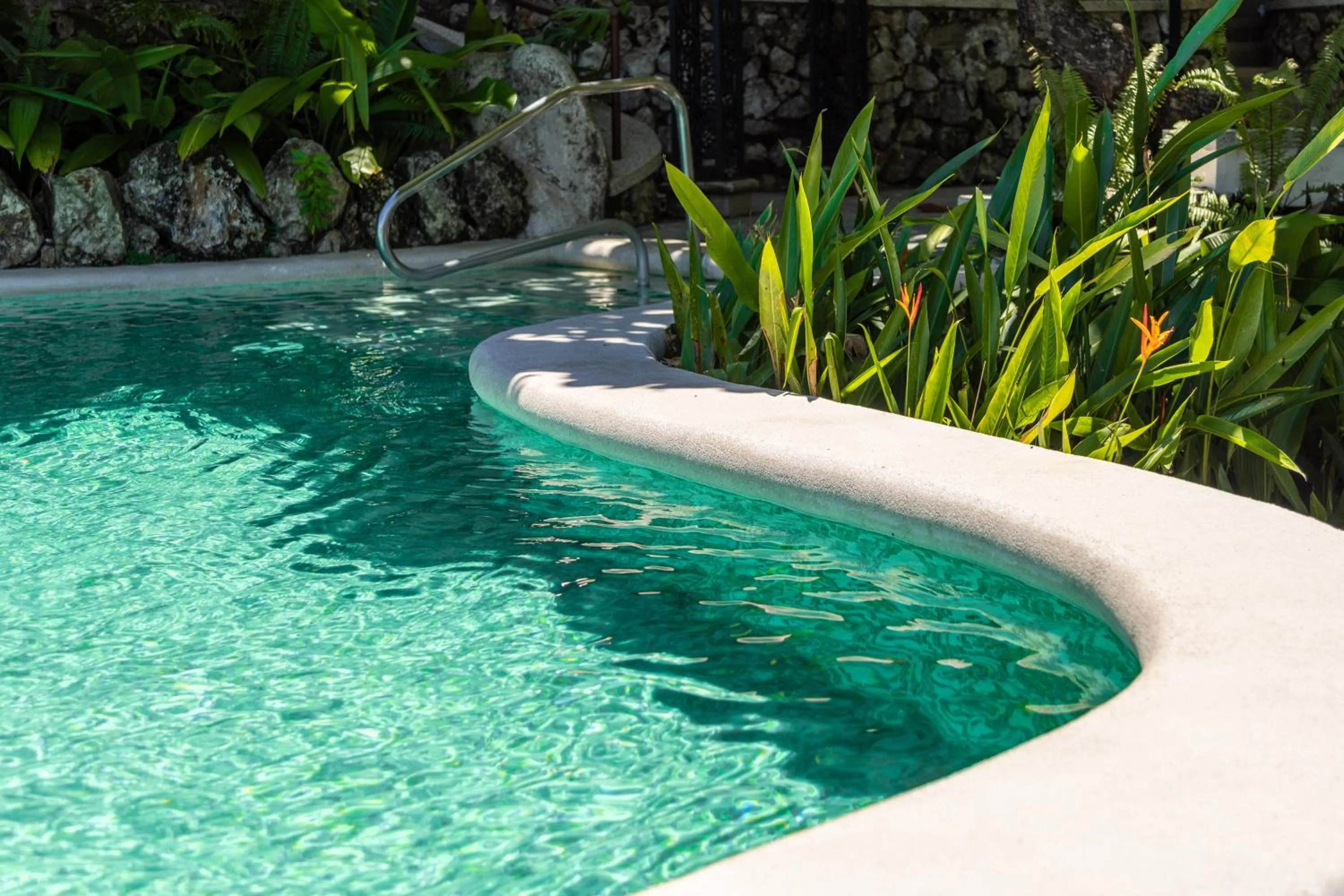 Swimming pool in Parador Nature Resort and Spa