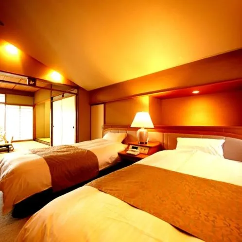 Bed in Hotel Okuyumoto
