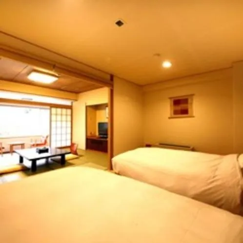 Bed in Hotel Okuyumoto