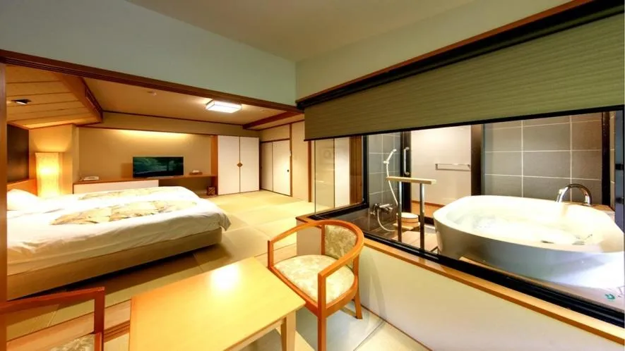 Bed in Hotel Okuyumoto