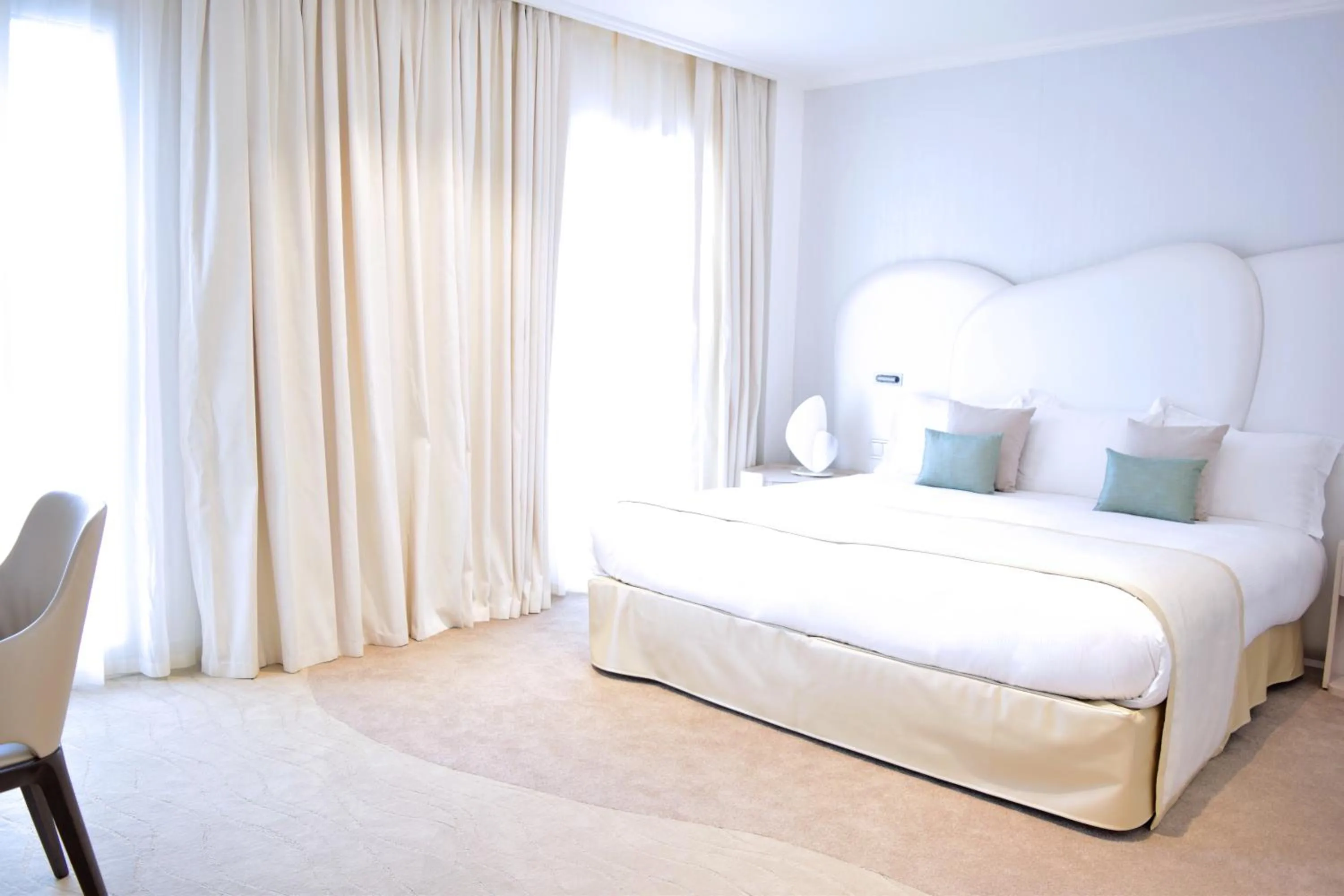 Bed in Appartements La Cigale