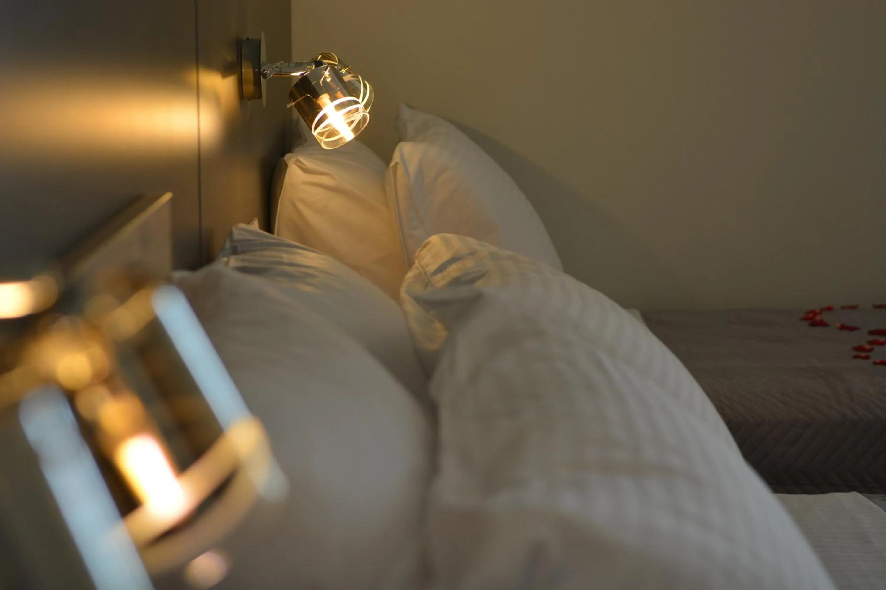 Bed in Riposo Studios & Apartments