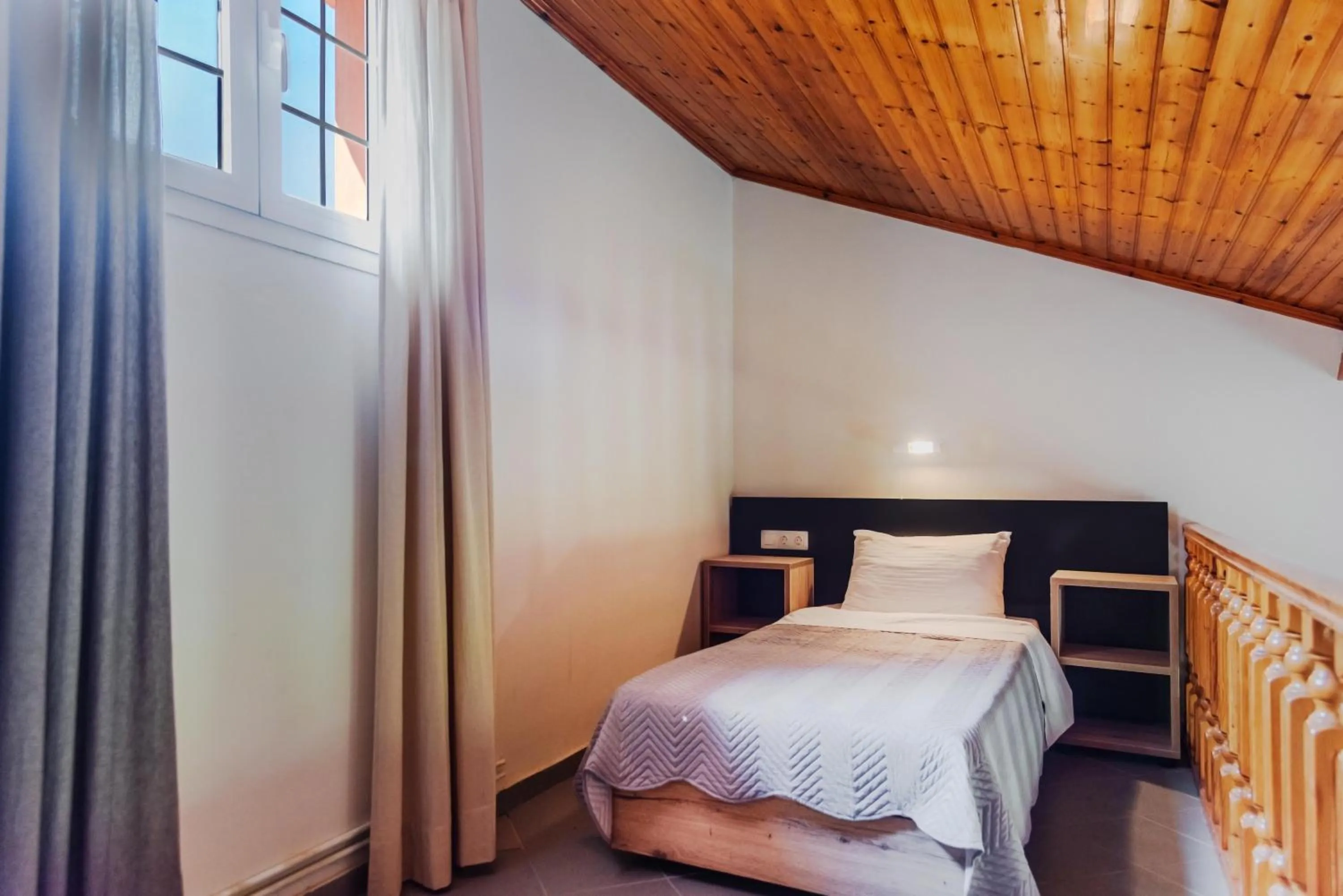 Bed in Riposo Studios & Apartments