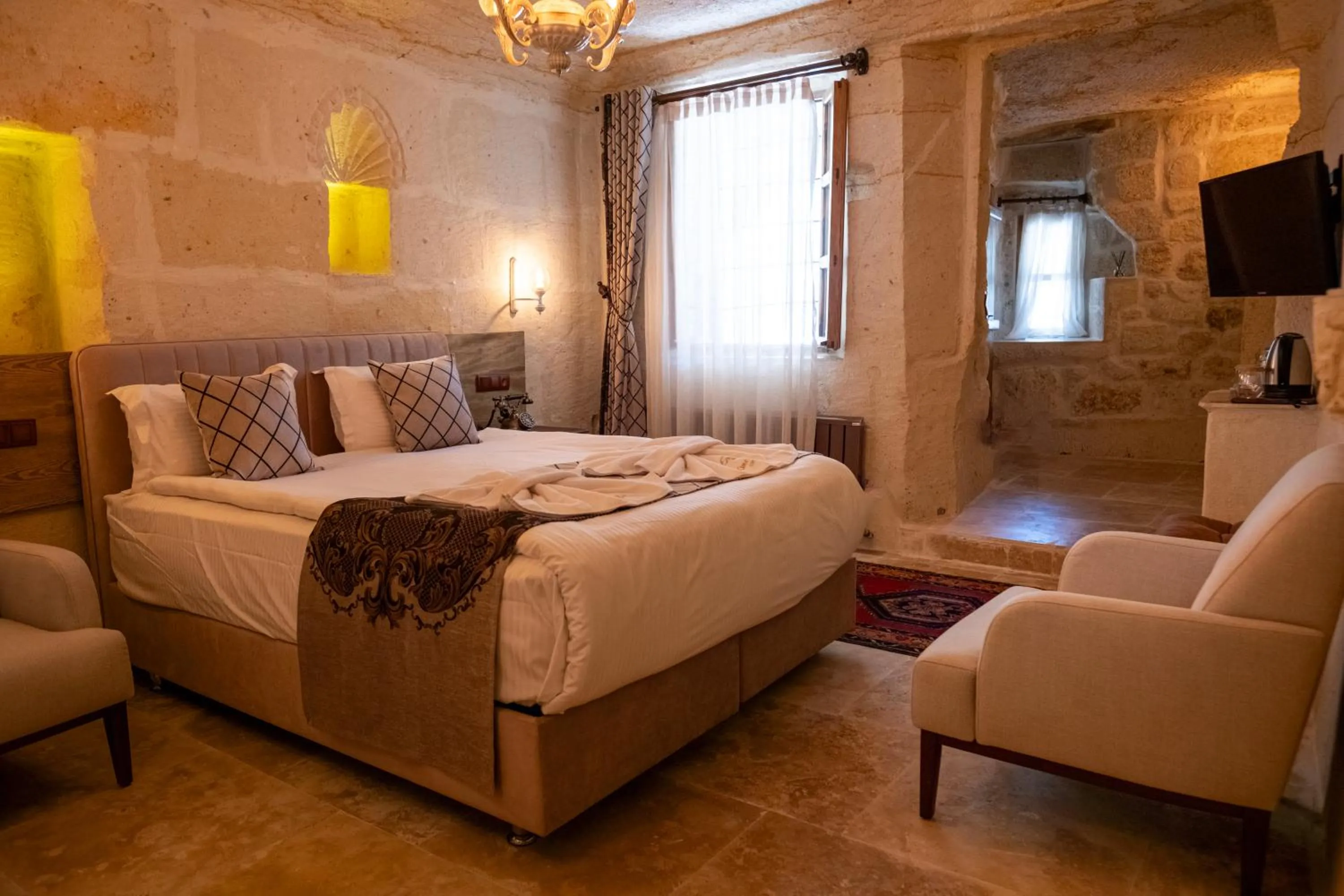 Bed in Urgup Evi Cave Hotel