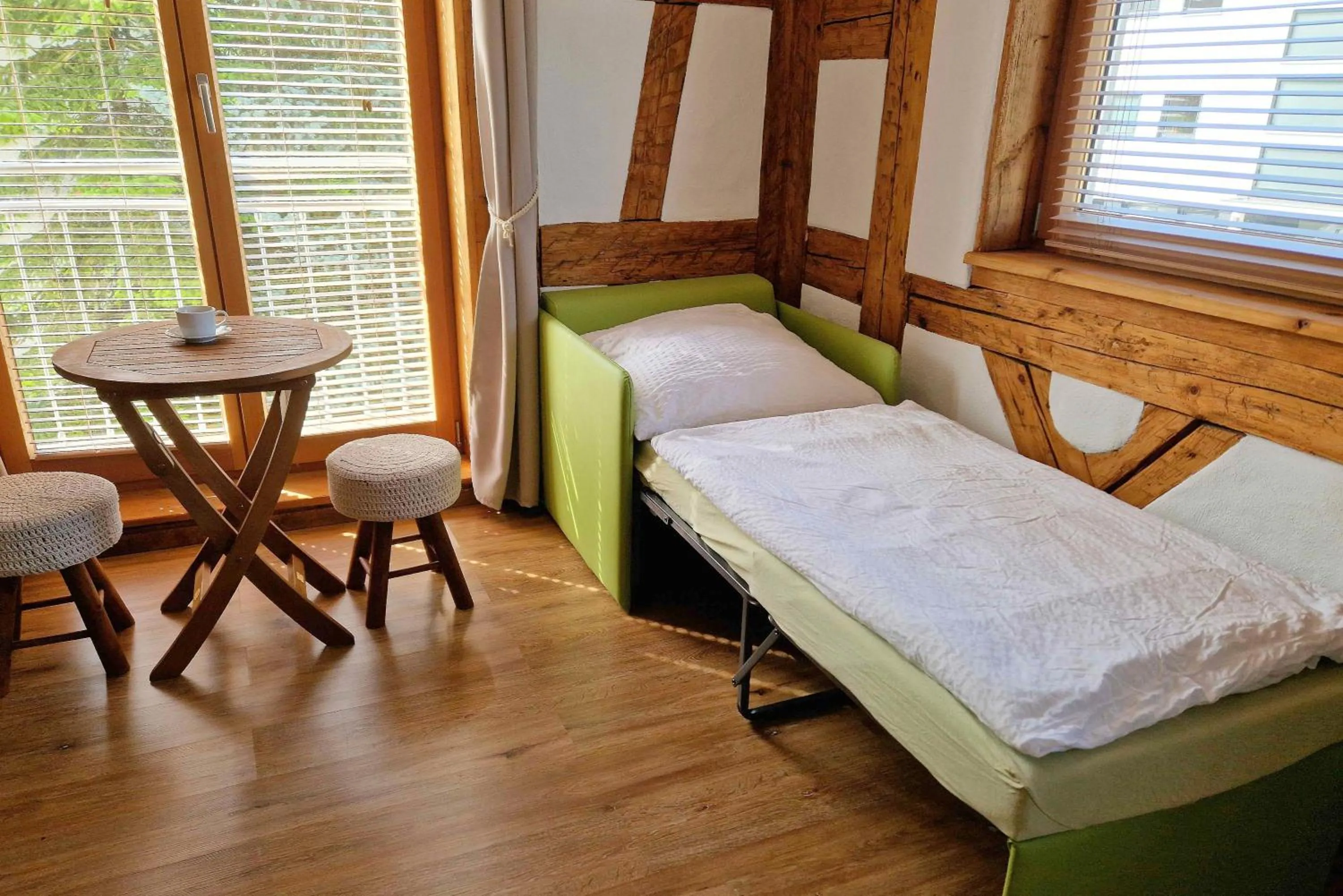 Bed in Waldvogel Ferienzimmer klimatisiert
