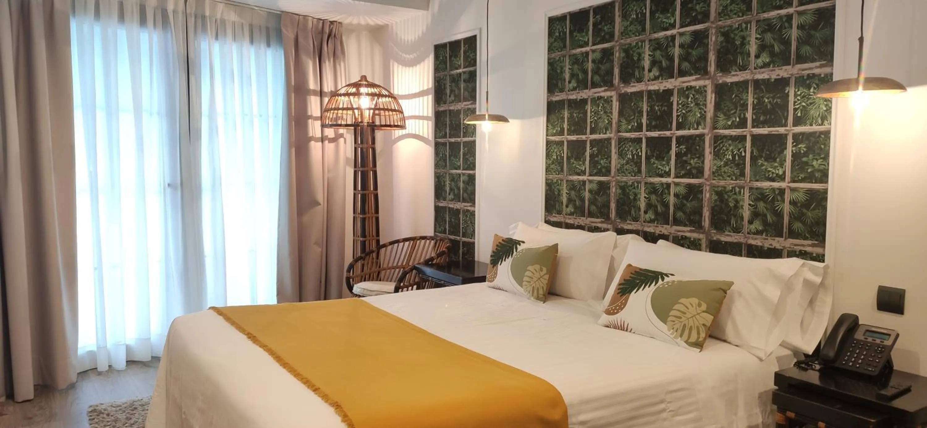 Bed in Le Petit Boutique Hotel