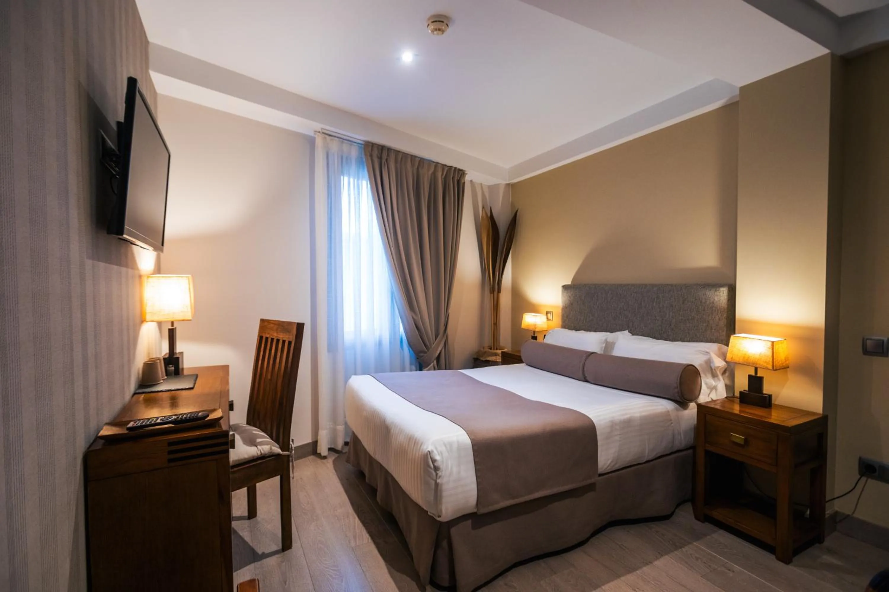 Bed in Le Petit Boutique Hotel