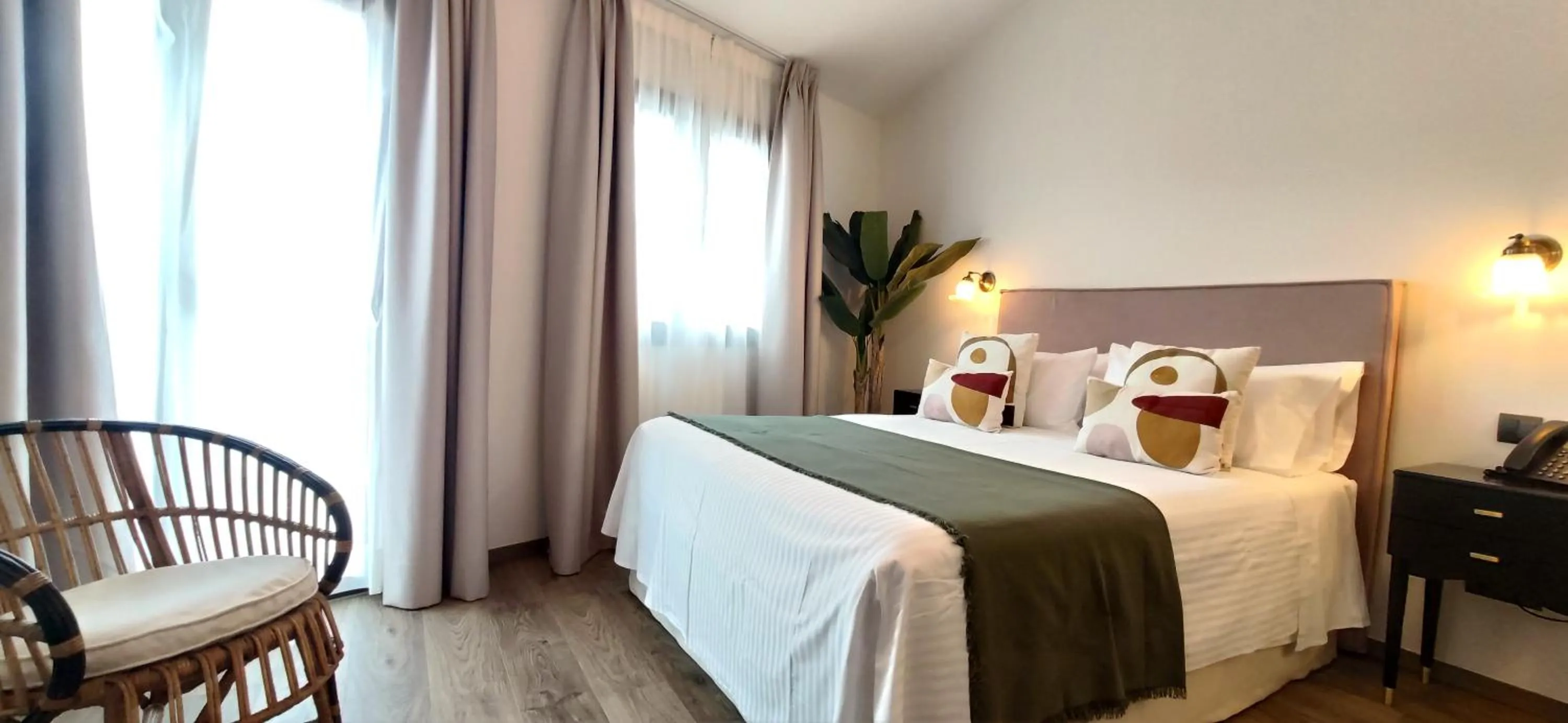 Bed in Le Petit Boutique Hotel