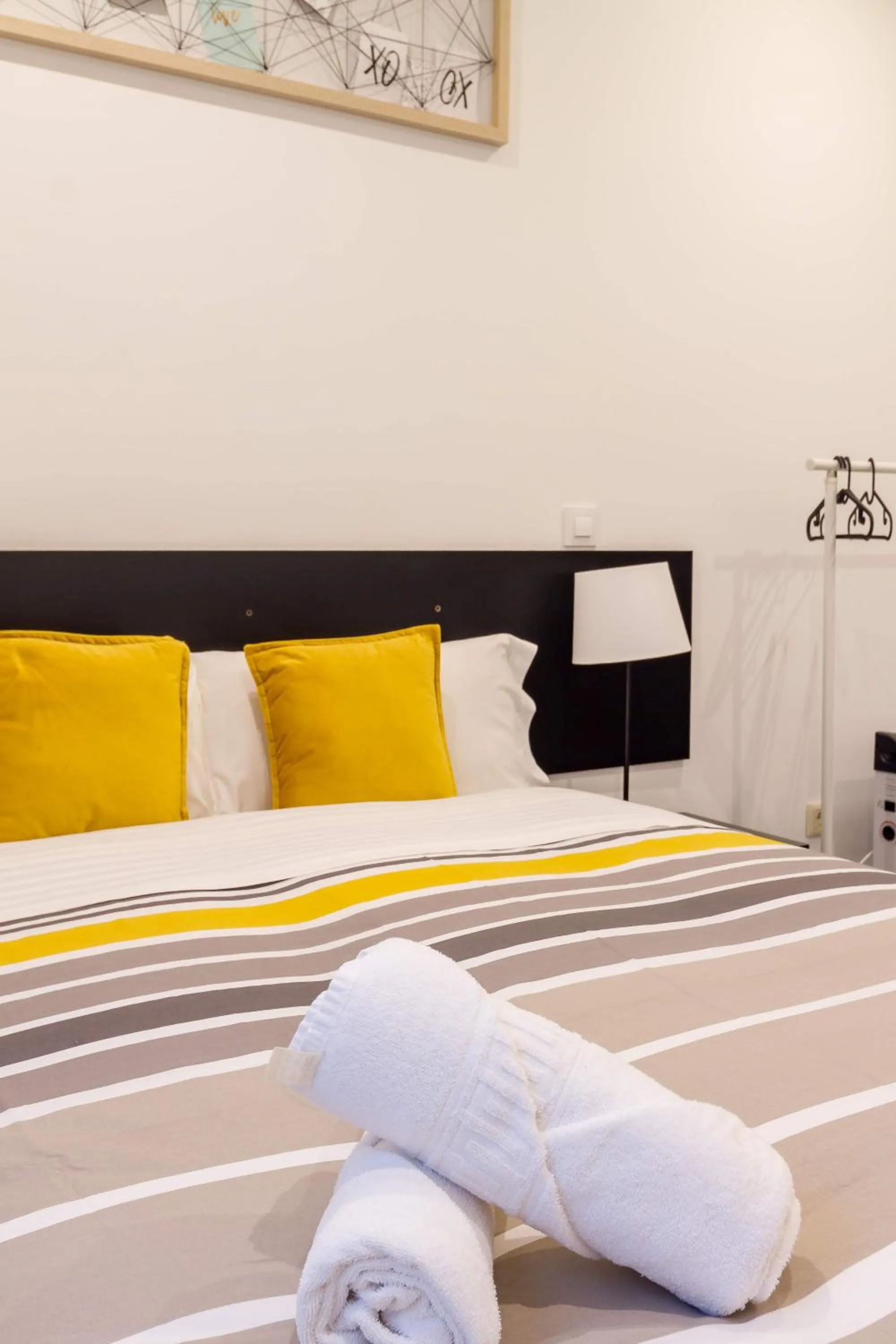 Bed in AYZ Javier Cabrini - Auto check-in property