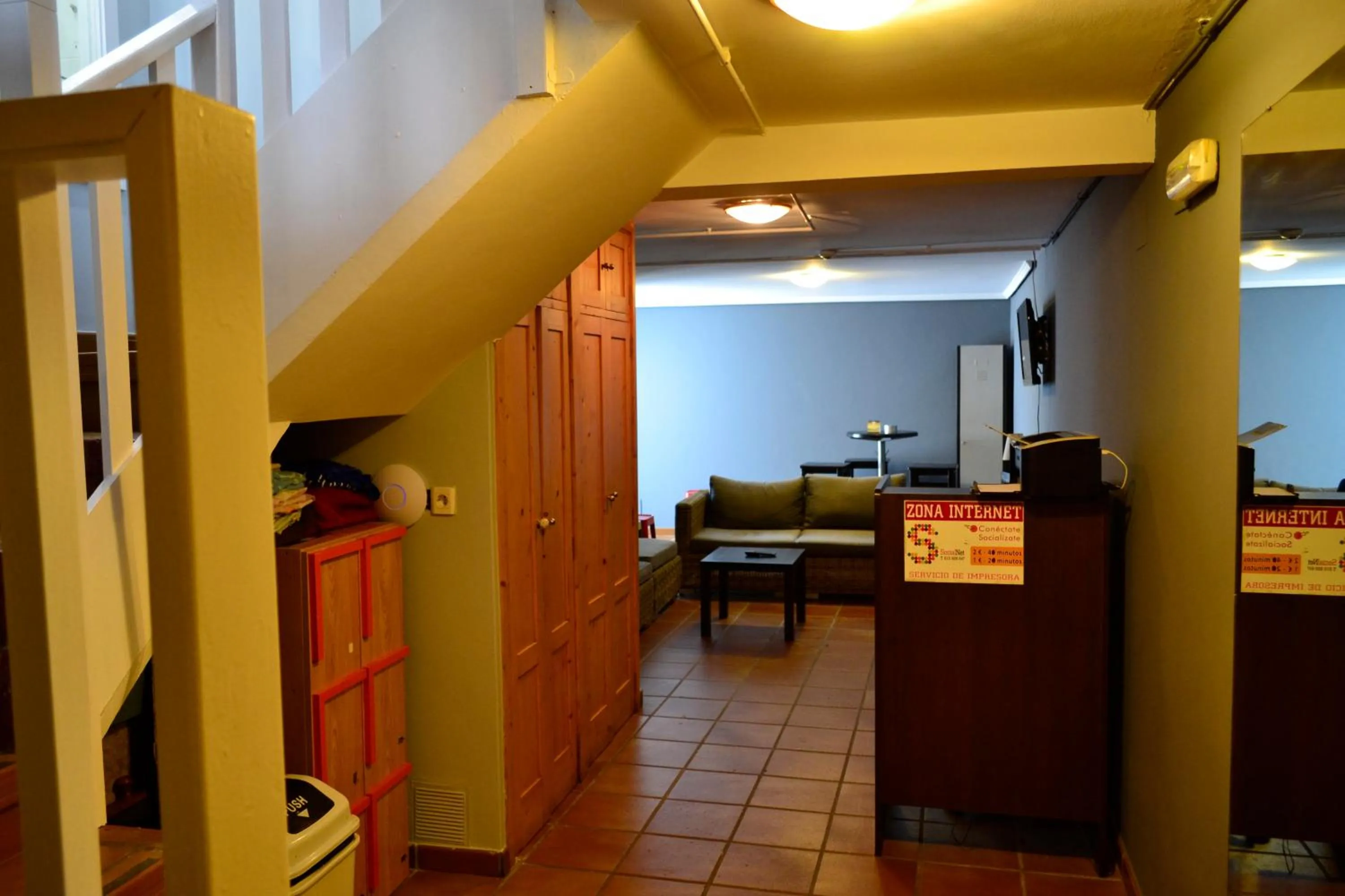 Communal lounge/ TV room, Bed in Albergue O Fogar de Teodomiro