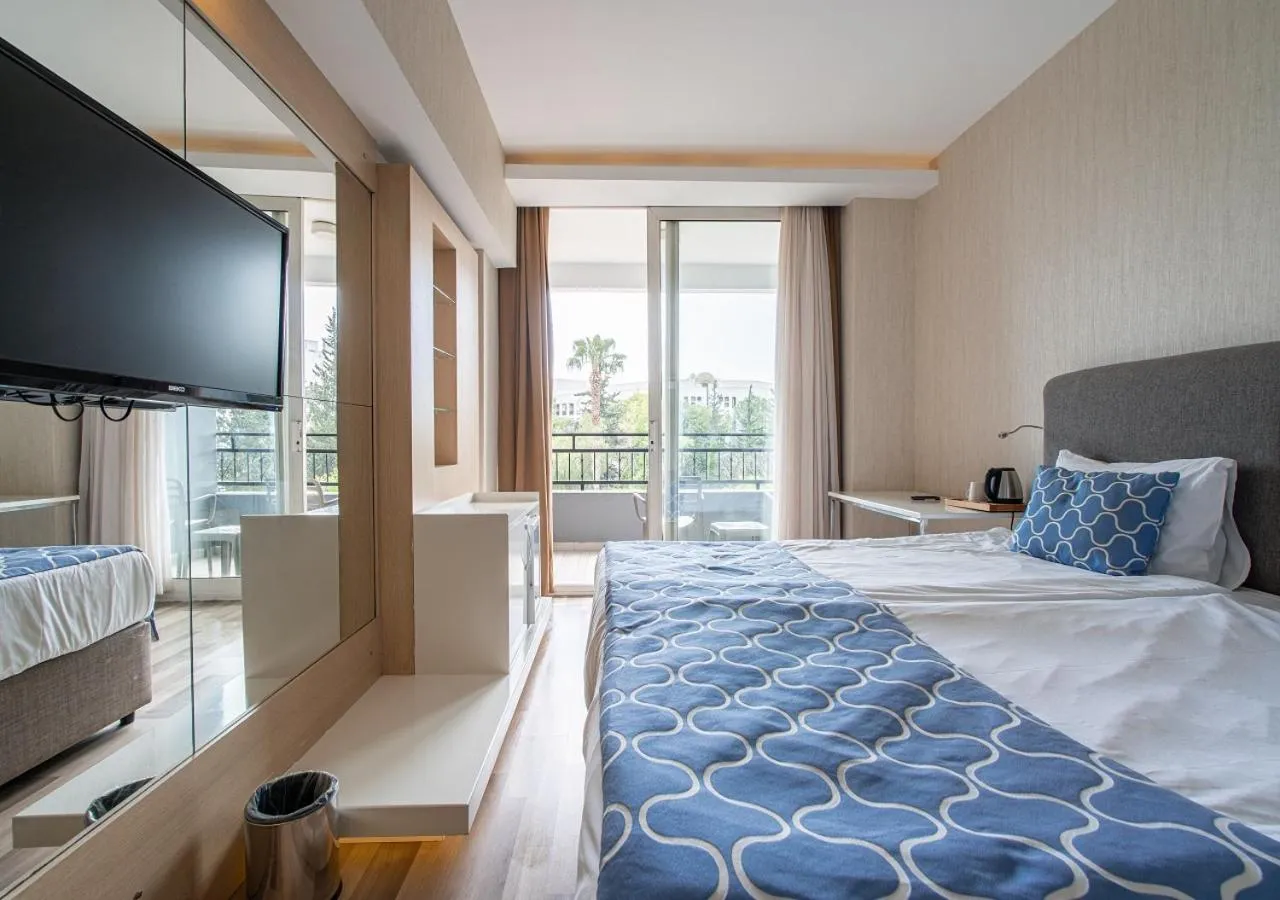 Bed in Amara Comfort Resort