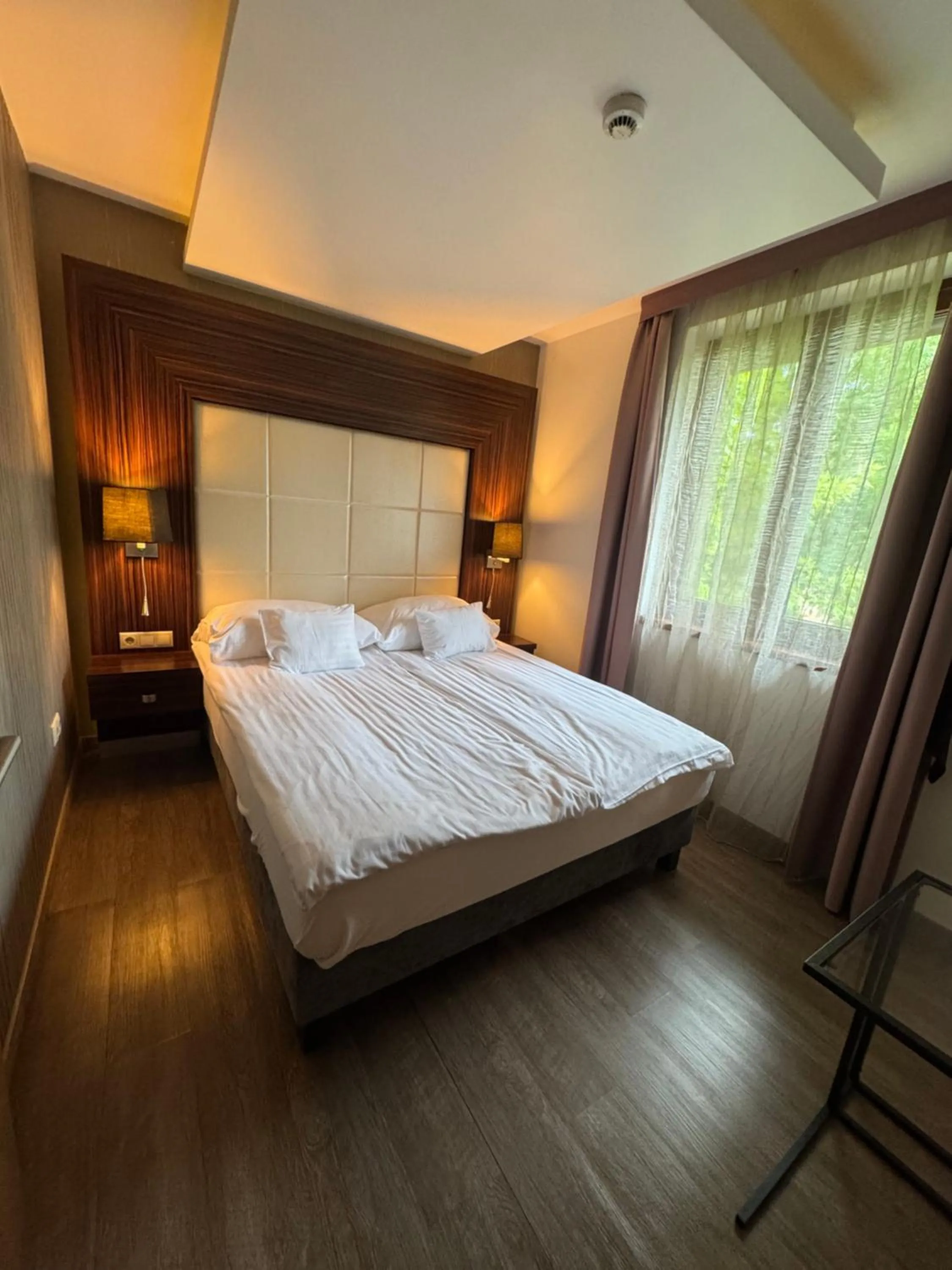 Bed in Duna Garden Hotel