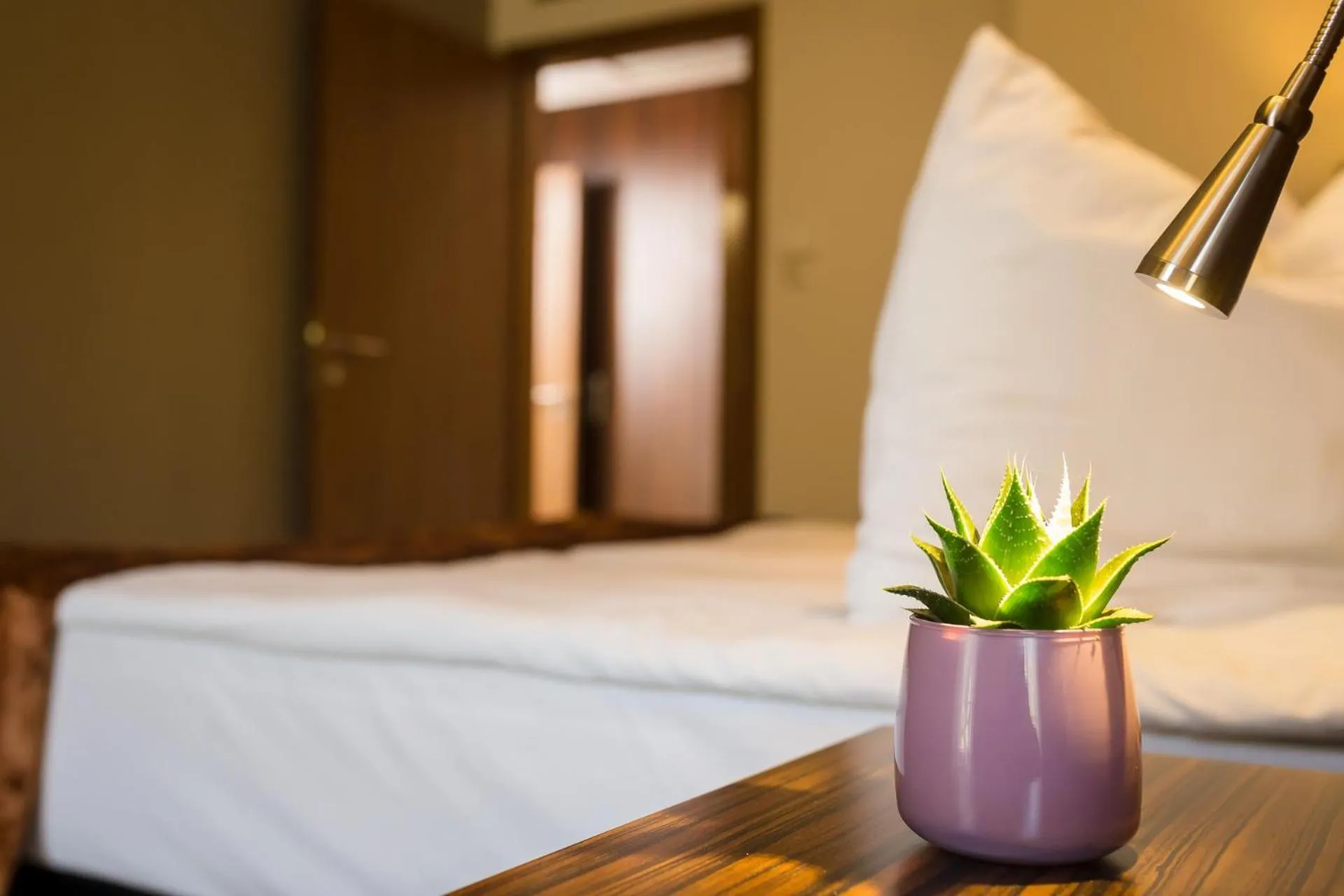 Bed in Duna Garden Hotel