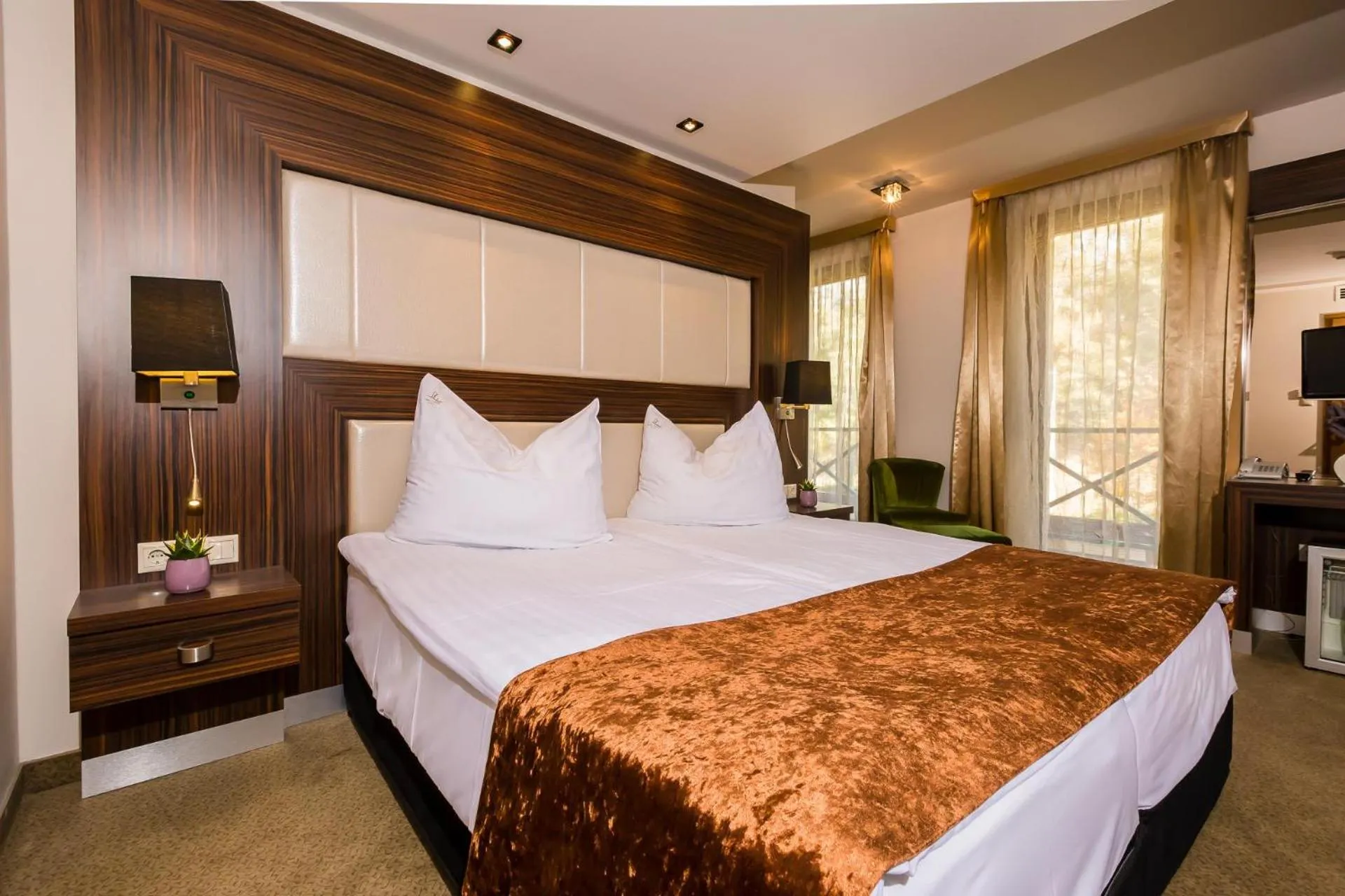 Bed in Duna Garden Hotel