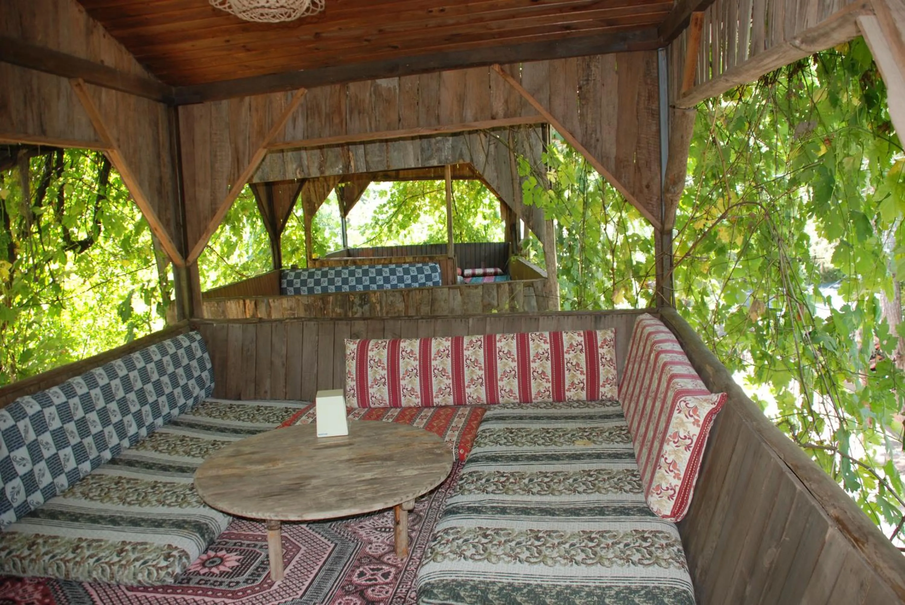 Seating area in Olympos Camlık Pension