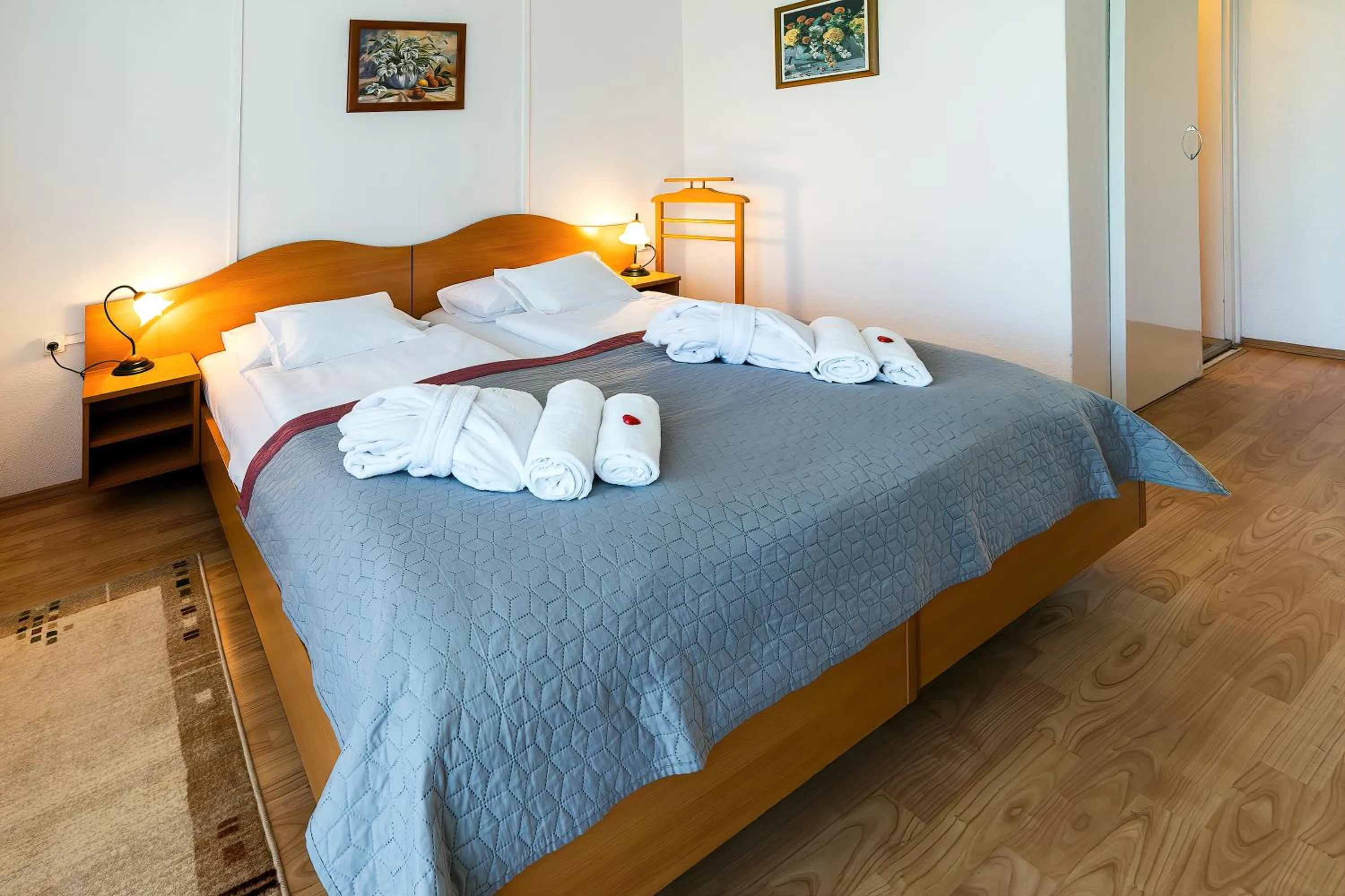 Bed in Napfény Hotel