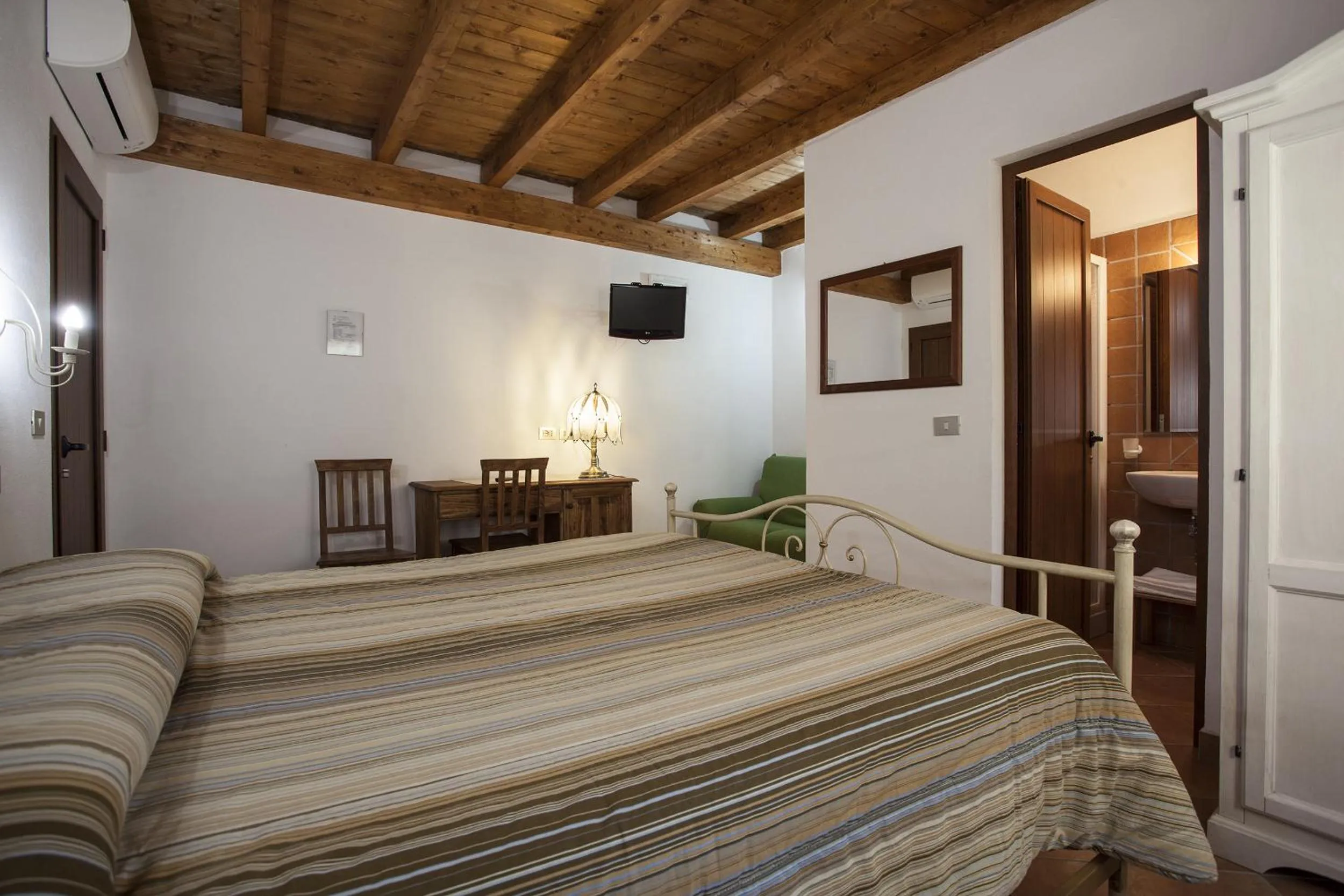 Photo of the whole room, Bed in Affittacamere Mariella