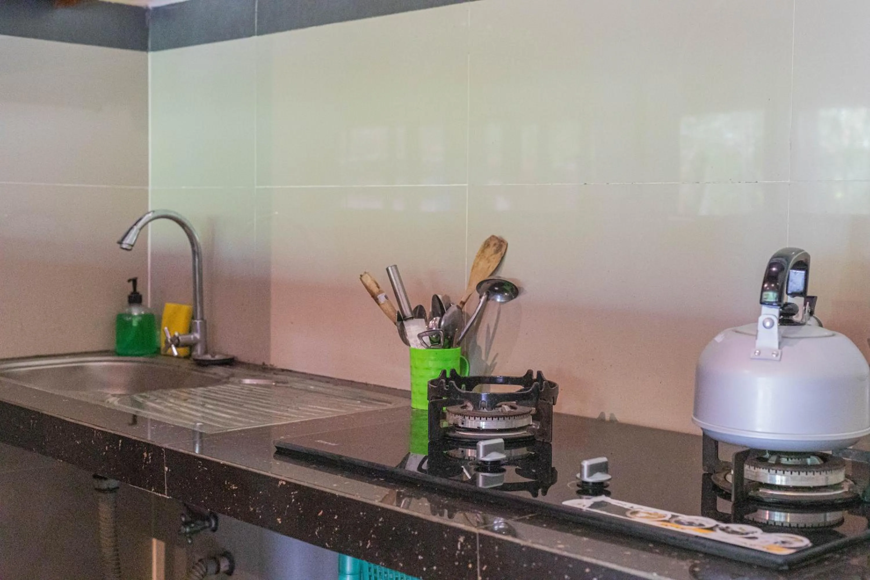 Kitchen or kitchenette in Sari Bamboo Bungalows