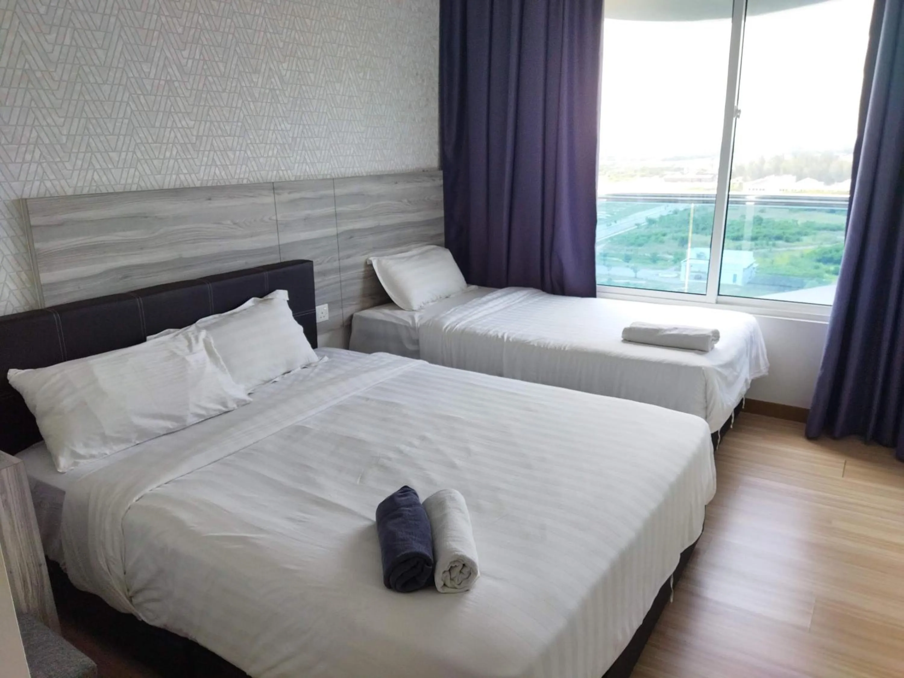 Bed in ExcluSuites Malacca @ The Wave Residence