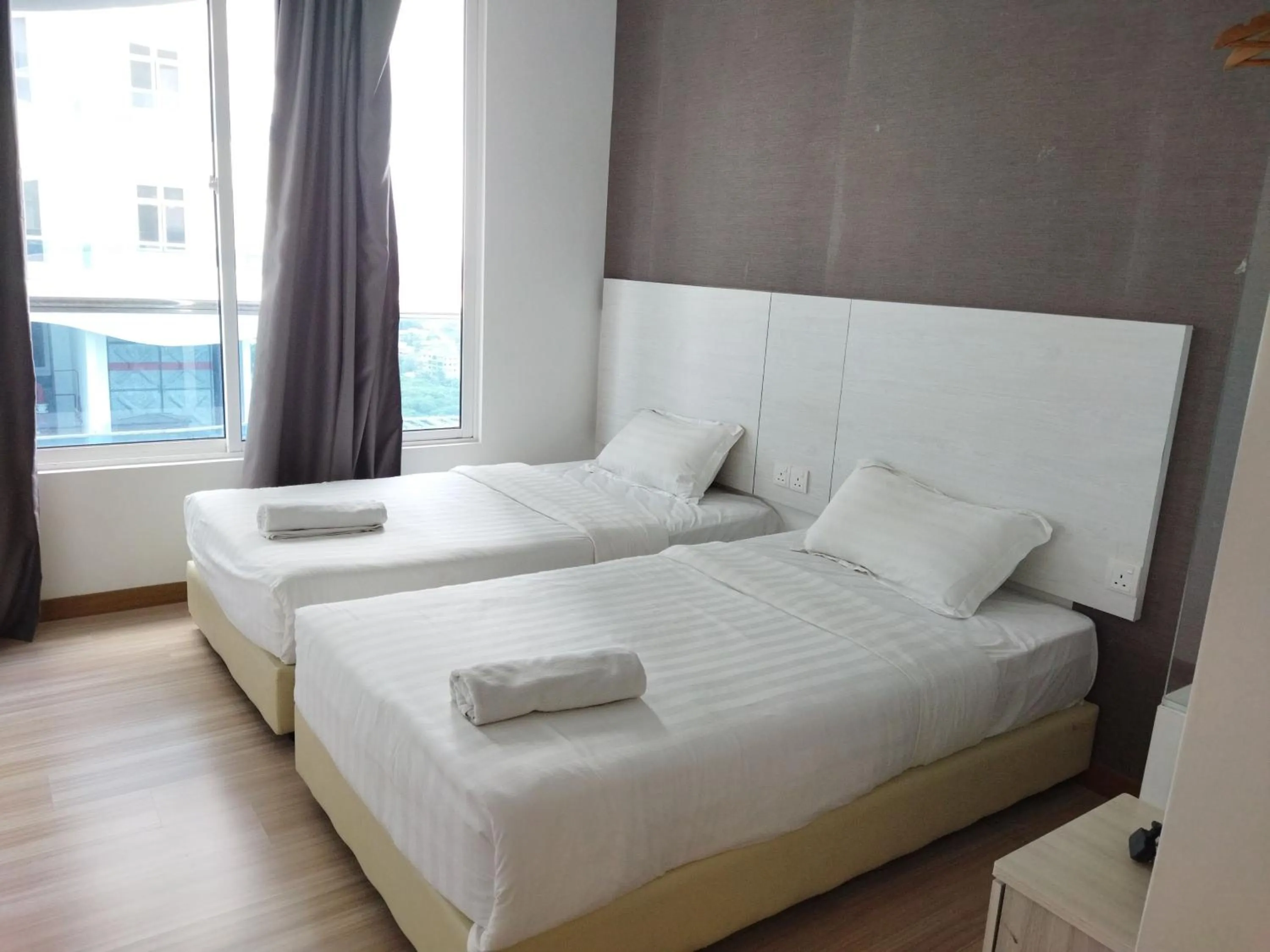 Bed in ExcluSuites Malacca @ The Wave Residence