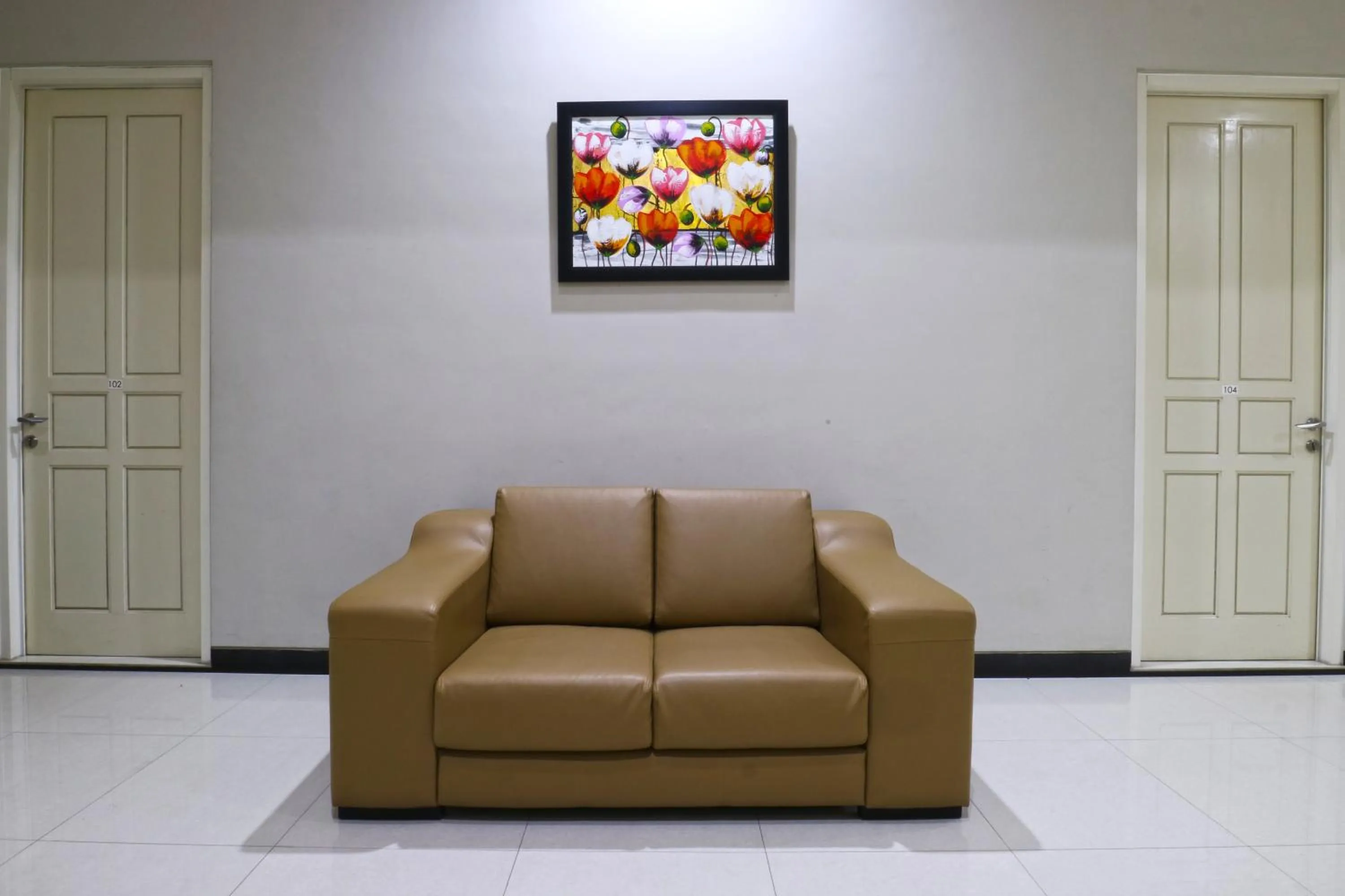 Communal lounge/ TV room in Chiaro Hotel Syariah