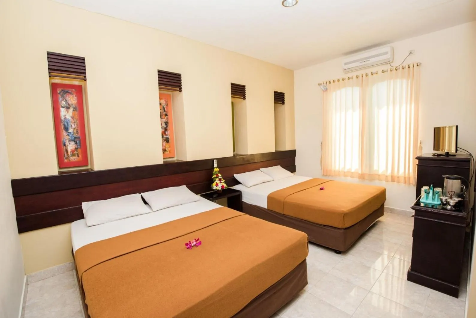 Bed in Hotel Puri Nusa Indah