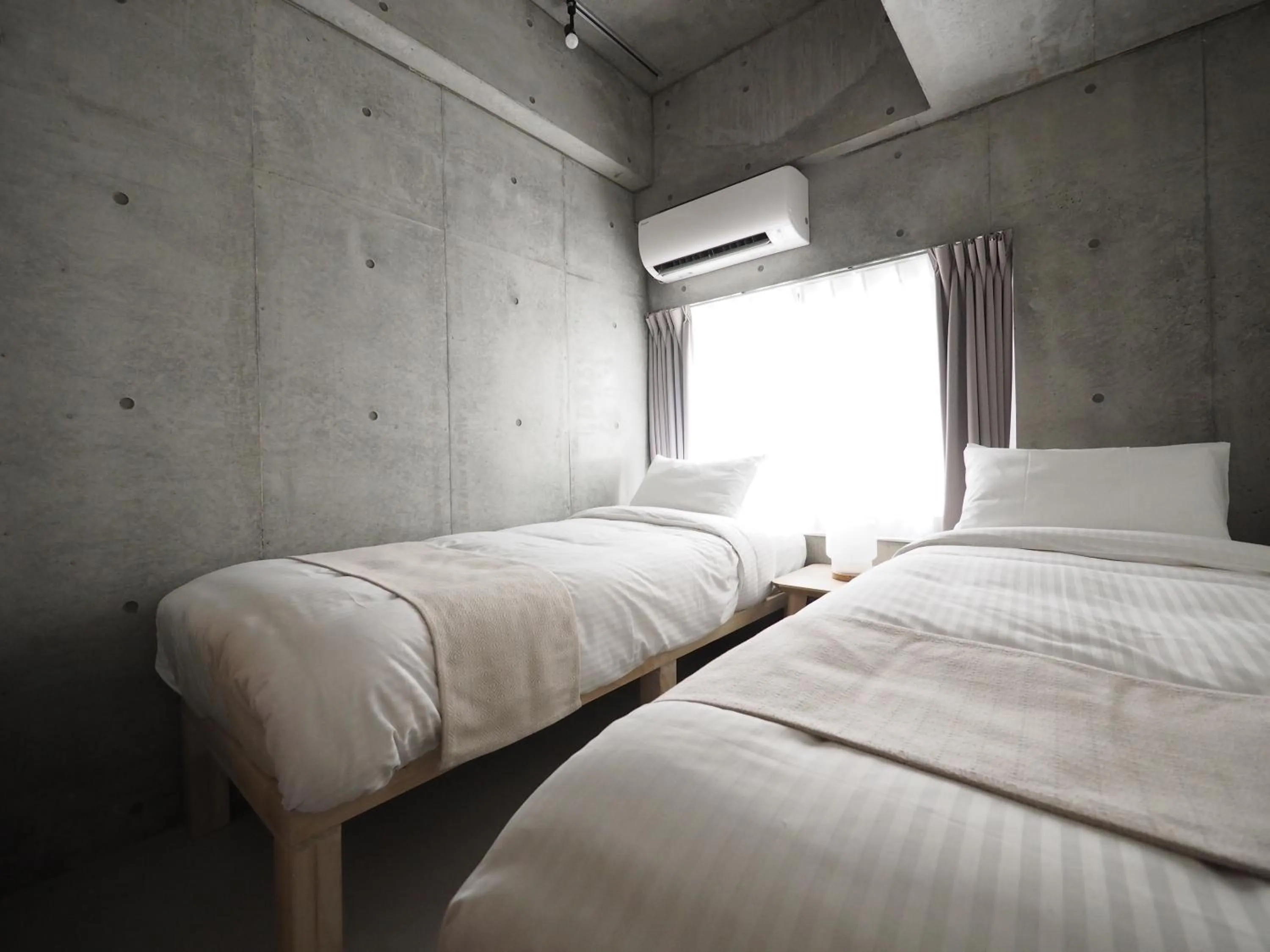 Bed in Smi:re Stay Oshiage