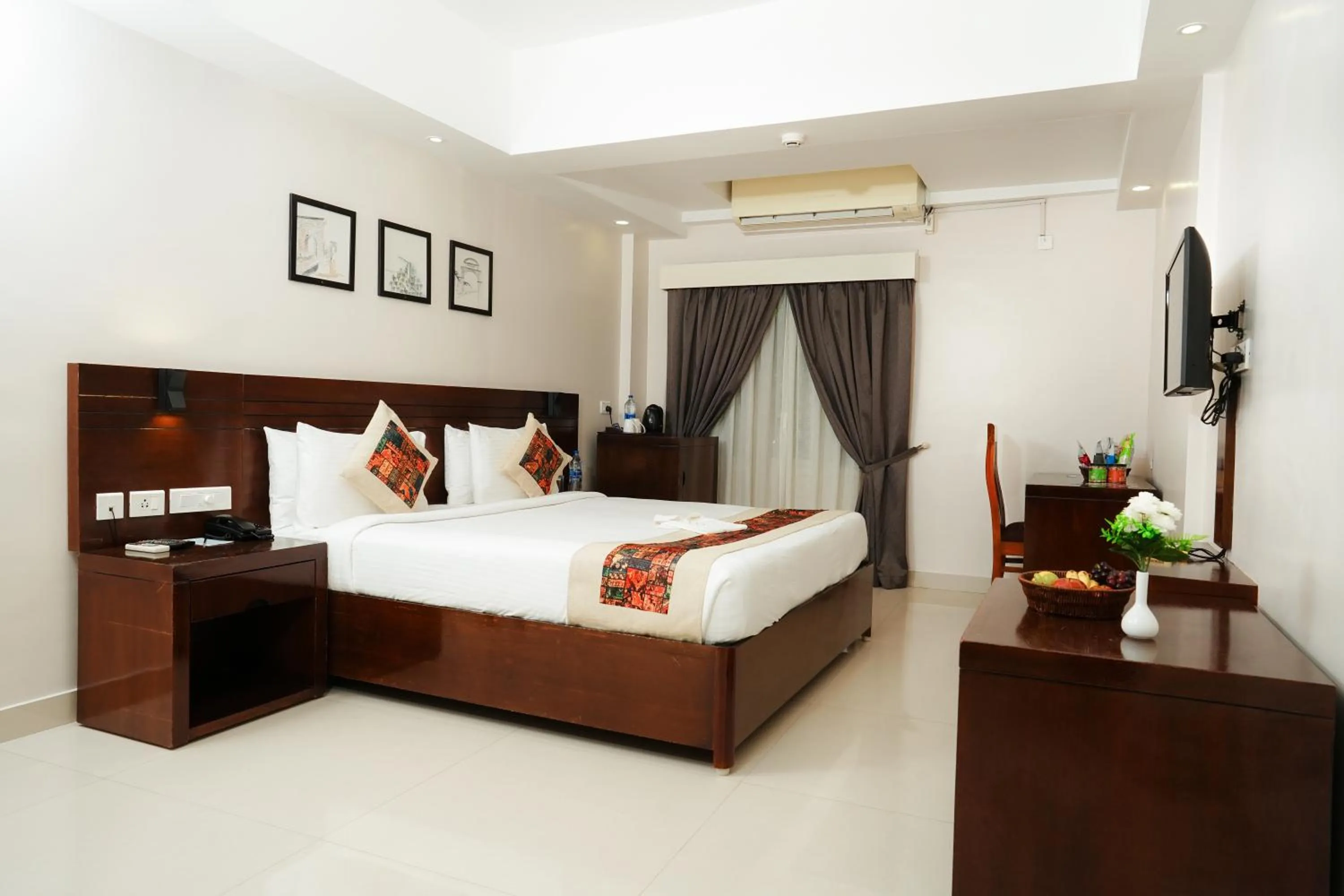 Bed in D Fort Hotel Kollam