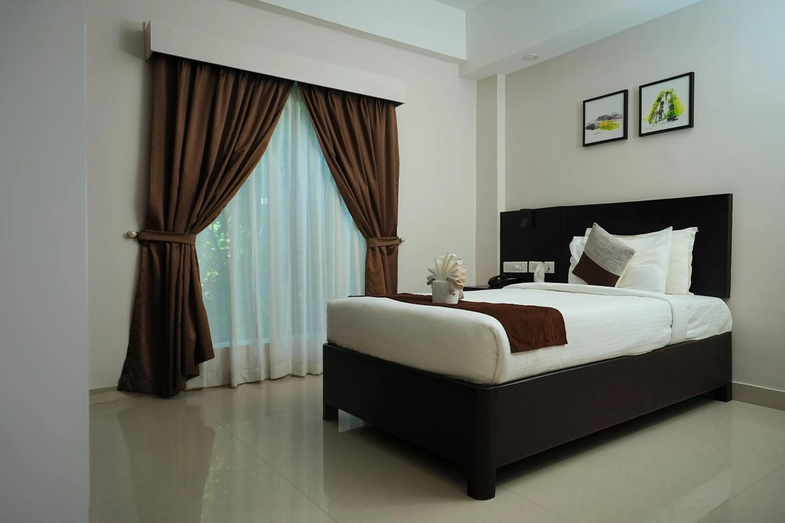 Bed in D Fort Hotel Kollam