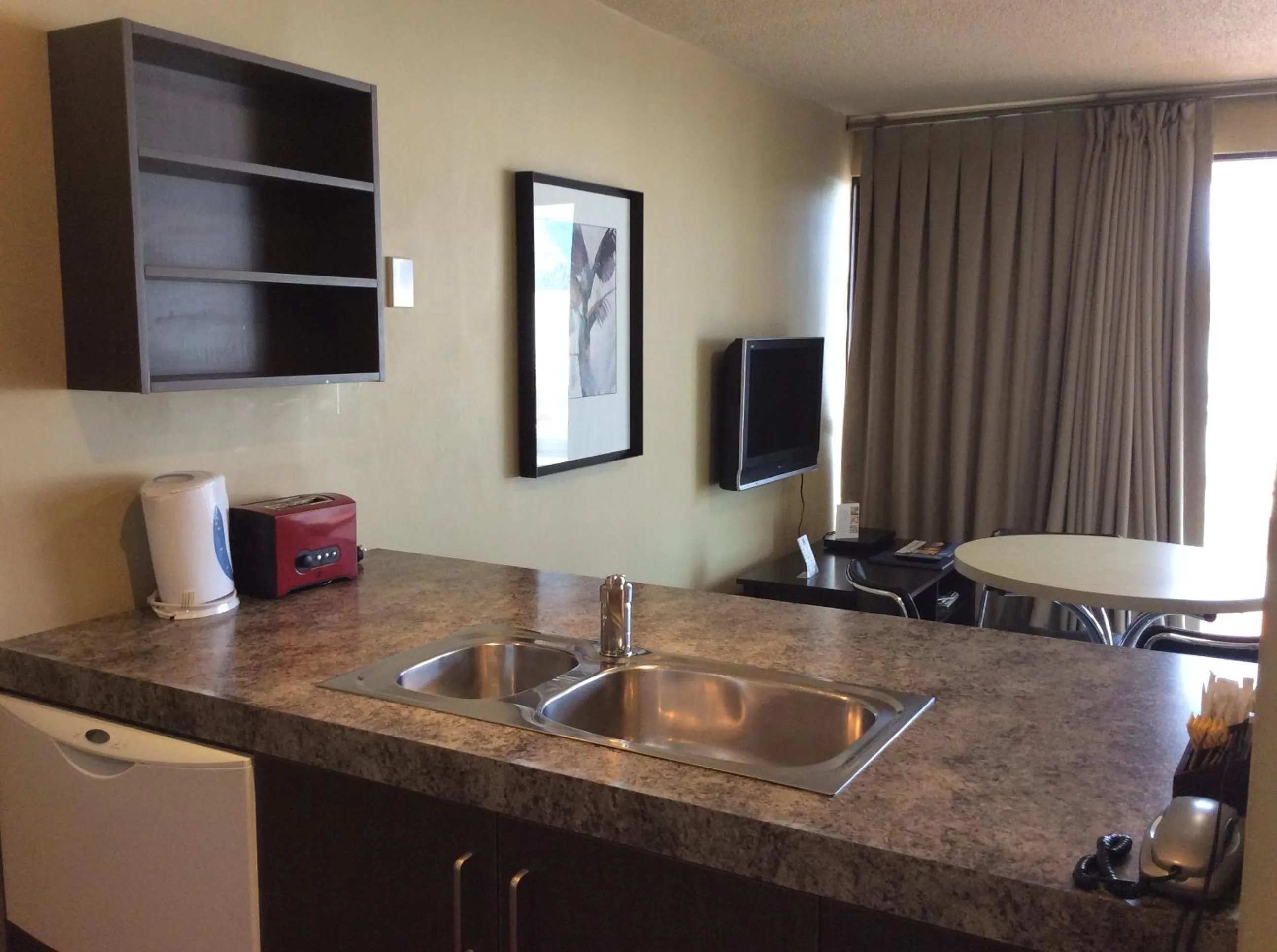 Kitchen or kitchenette in The Lofts Apartments