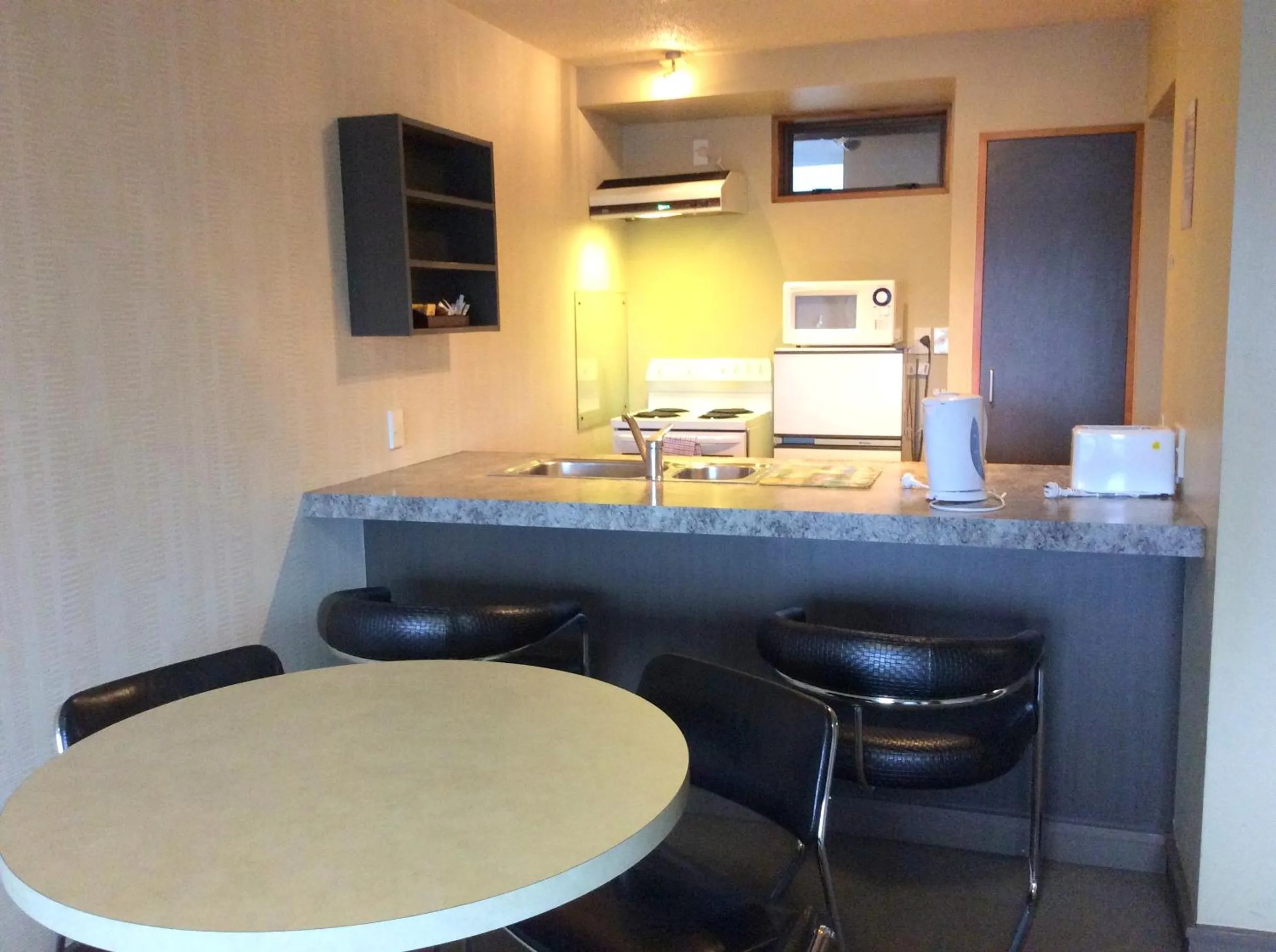 Kitchen or kitchenette in The Lofts Apartments