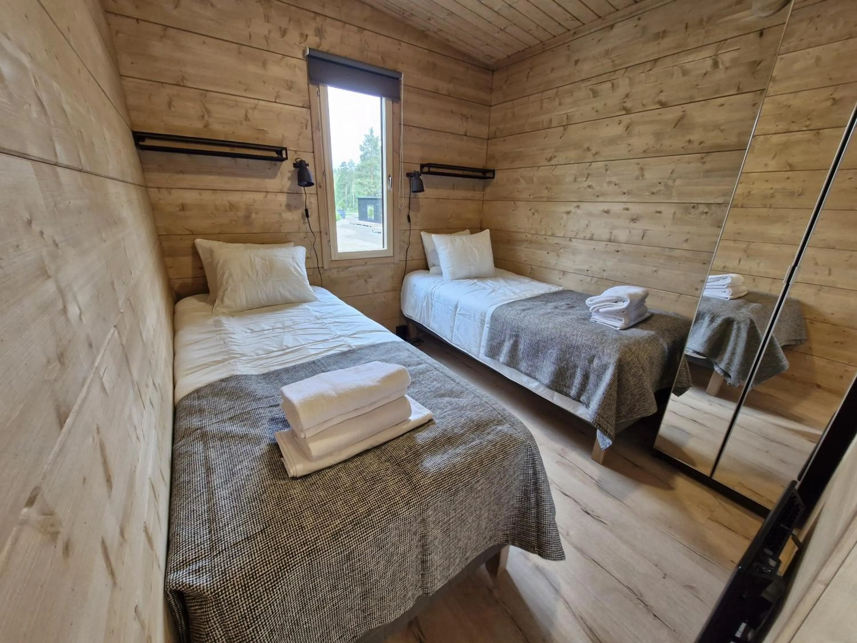 Bed in Rauhalahti Holiday Homes