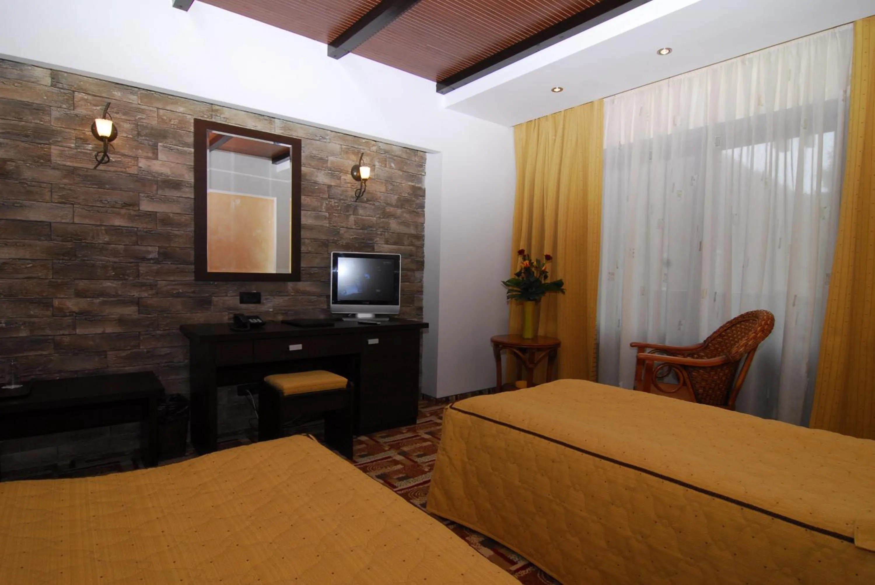 Bed in Casa Iris-Hotel & Restaurant