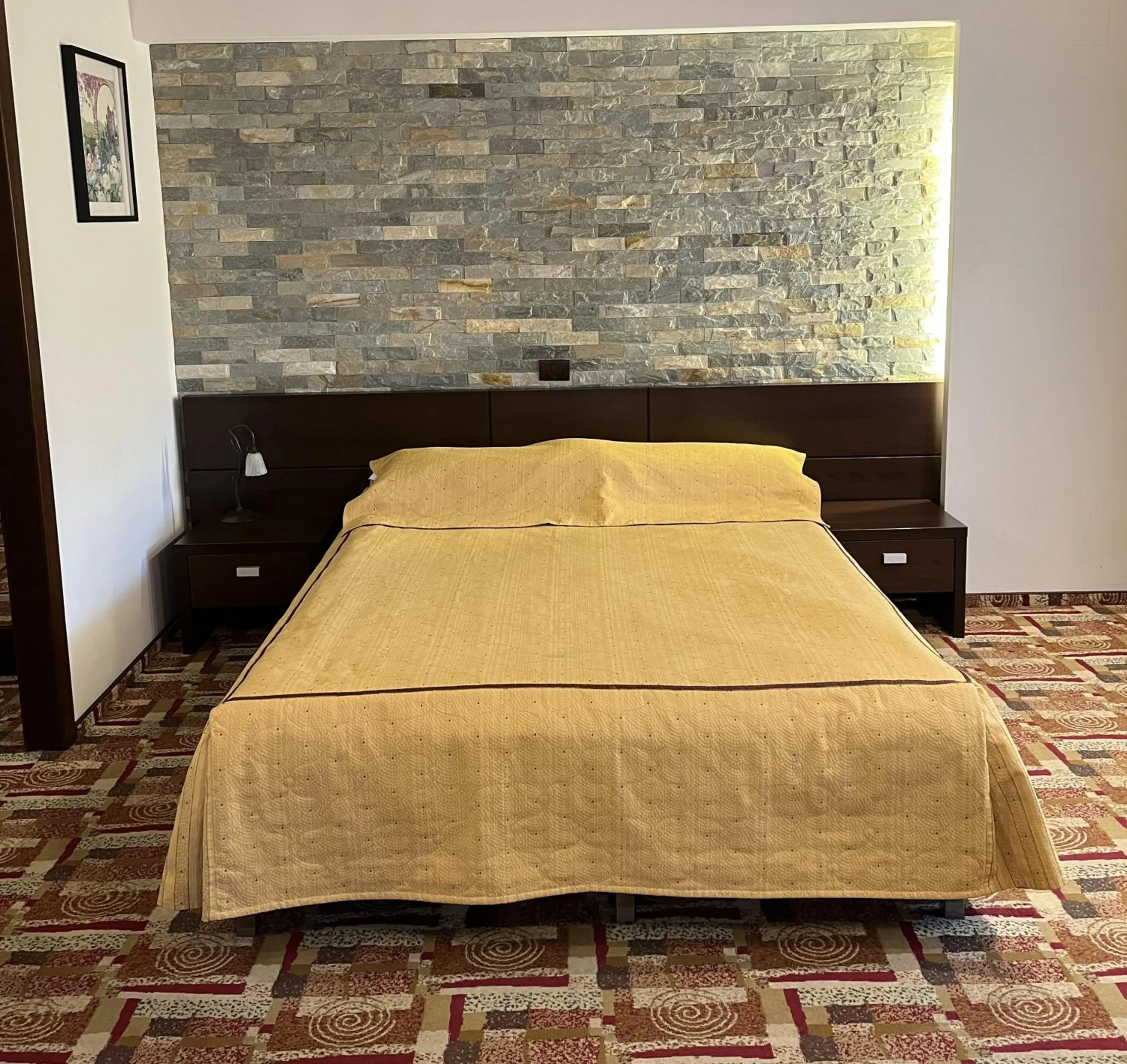 Bed in Casa Iris-Hotel & Restaurant